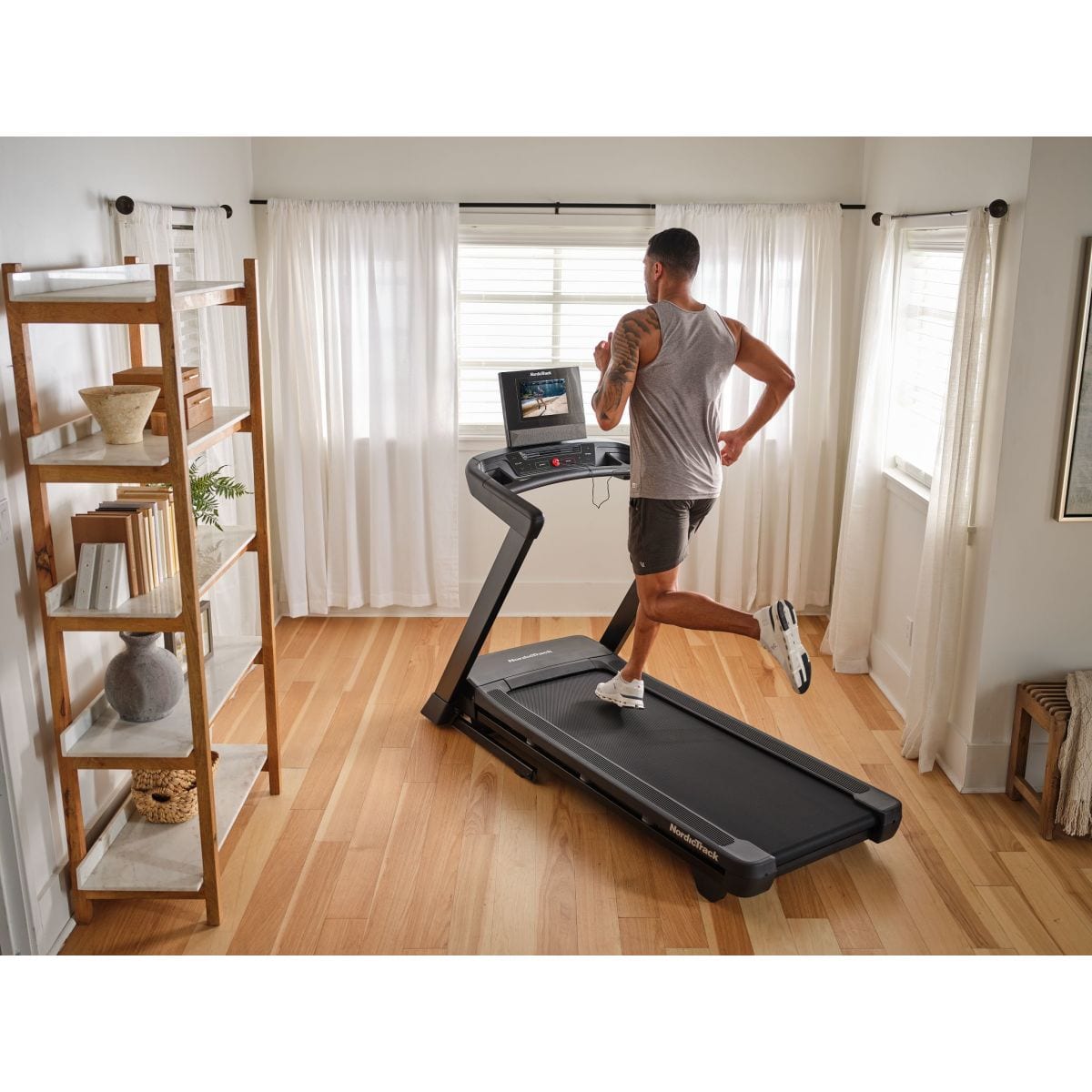Alt View 13. NordicTrack - NordicTrack T Series 10 Treadmill with 10" Tilting Touchscreen and Compact Design - Black.