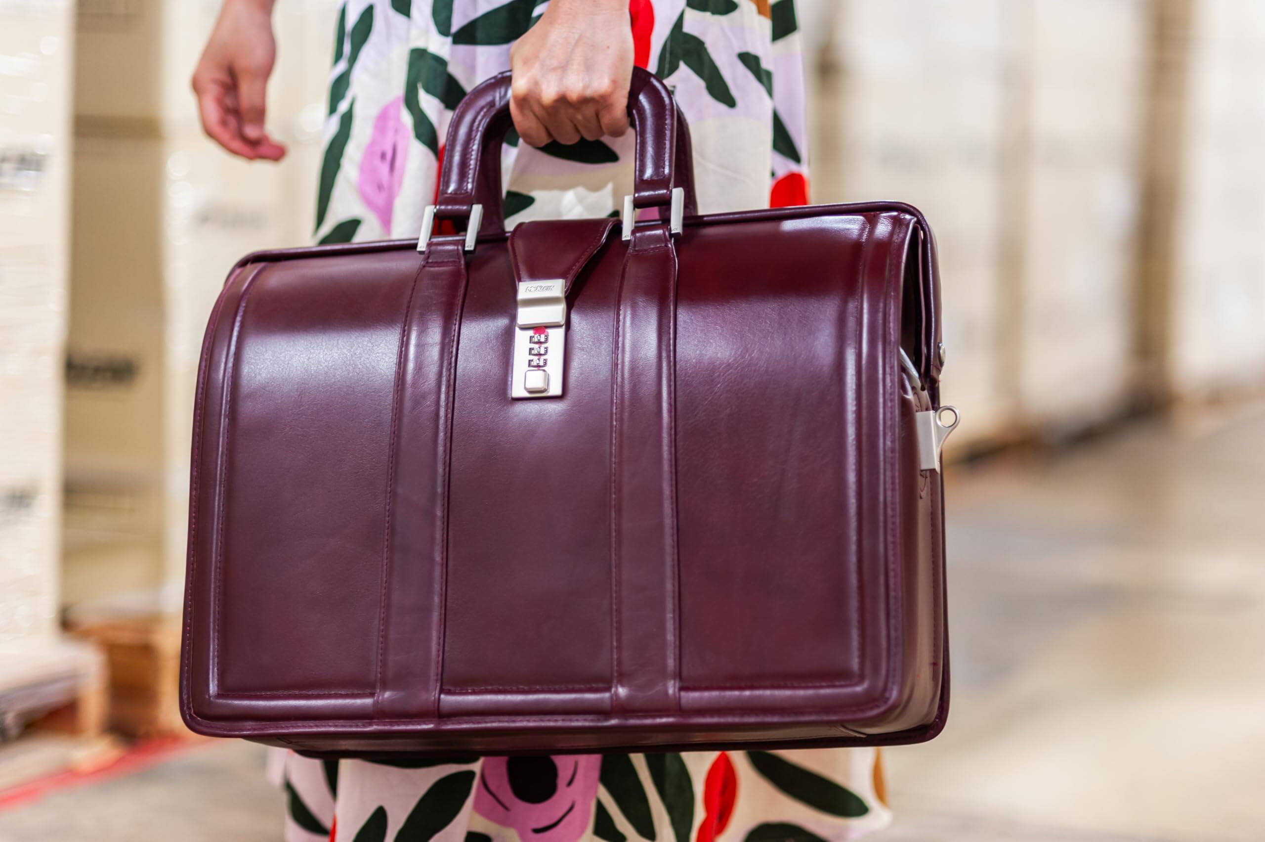 Alt View 2. McKleinUSA - 17" Laptop Briefcase Top-Grain Cowhide Leather, Padded 3-Section Organizer, 3-Digit Combination Lock, Neoprene Strap - Burgundy.