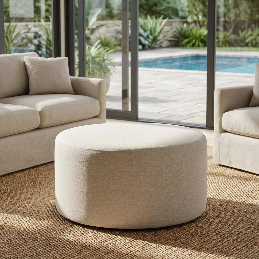 Left. Outdoor Escape - Round Heathered Fabric Upholstered Ottoman for Outdoor Spaces - White.