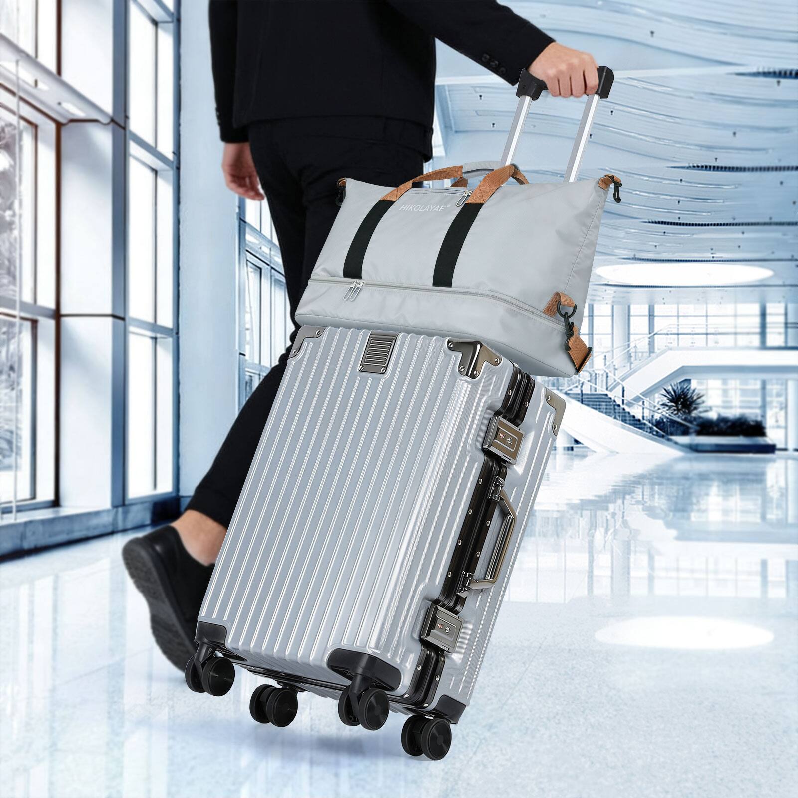 Alt View 4. Oumilen - 2 Piece Silver Travel Set – 20" ABS Aluminum Carry On with TSA Lock + Expandable Tote, Silent Wheels - Silver.