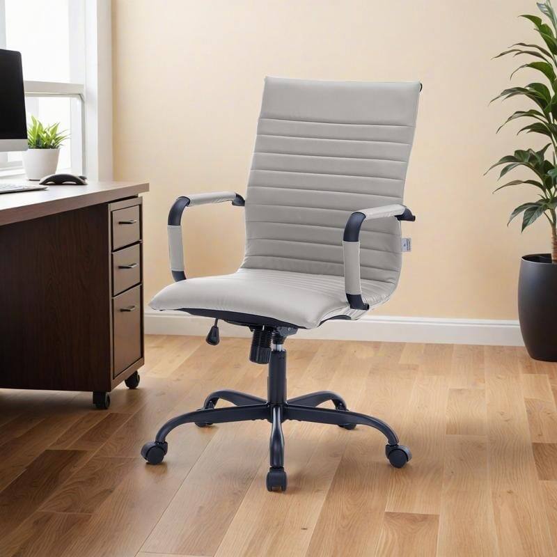 Angle. LeisureMod - Harris Ergonomic High-Back Office Chair Leather Upholstery, Adjustable Swivel, Tilt, and Black Iron Frame - Tan.
