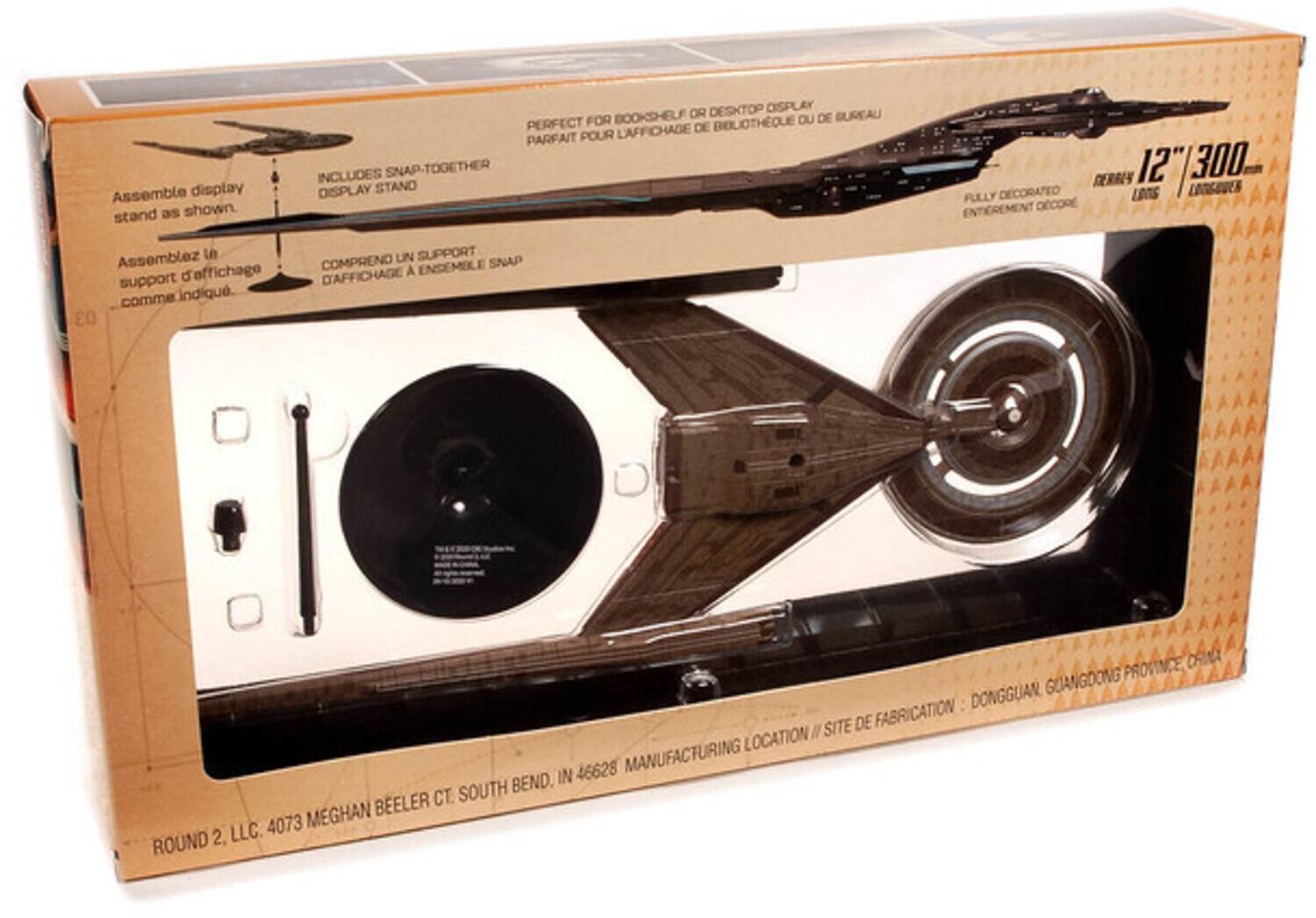 Assemble display stand as shown. OR DESKTOP DISPLAY FOR BOOKSHELF OU DE BUREAU PERFECT L'AFFICHAGE DE BIBLIOTHEQUE PARFAIT POUR INCLUDES SNAP-TOGETHER DISPLAY STAND DERBL 12" 300. DECORATED LONS LOGGOUER FULLY ENTEREMENT DECORE Assemblez Le support d'effichage comme indiqu. 03 UN SUPPORT COMPRENO ENDEMBLE SNAP DAFFICHAGE A PROVINCE CHINA DONGGUAN GUANGDONG SITE DE FABRICATION LOCATION N 46628 MANUFACTURING BEND. IN BEELER CT. SOUTH 4073 MEGHAN 2. LLC. ROUND