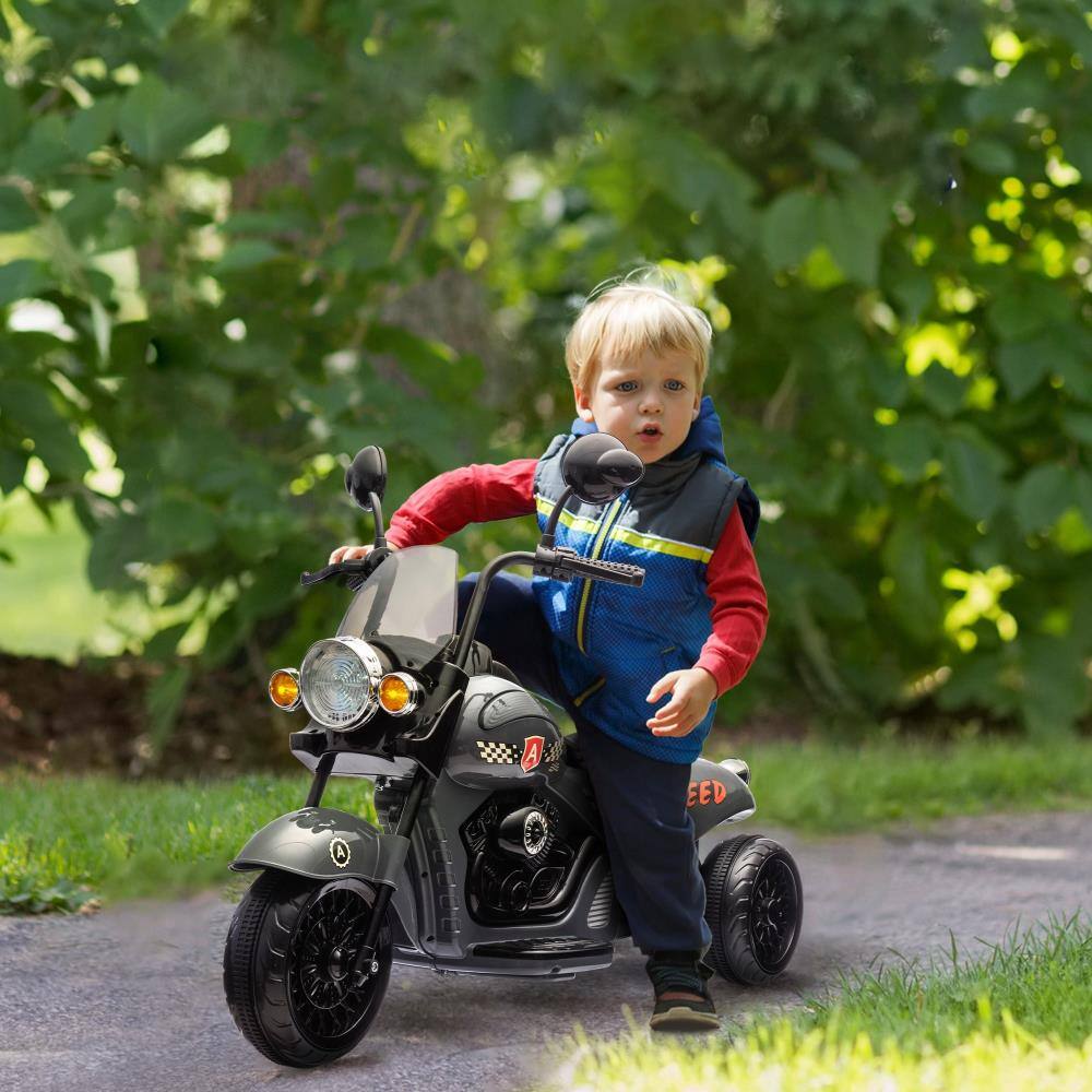 Angle. BreeBe - Qaba 6V Kids Electric 3-Wheel Motorcycle, Chopper Ride On w/ Headlights, Music, Forward & Reverse, Ages 3-6 - Gray.