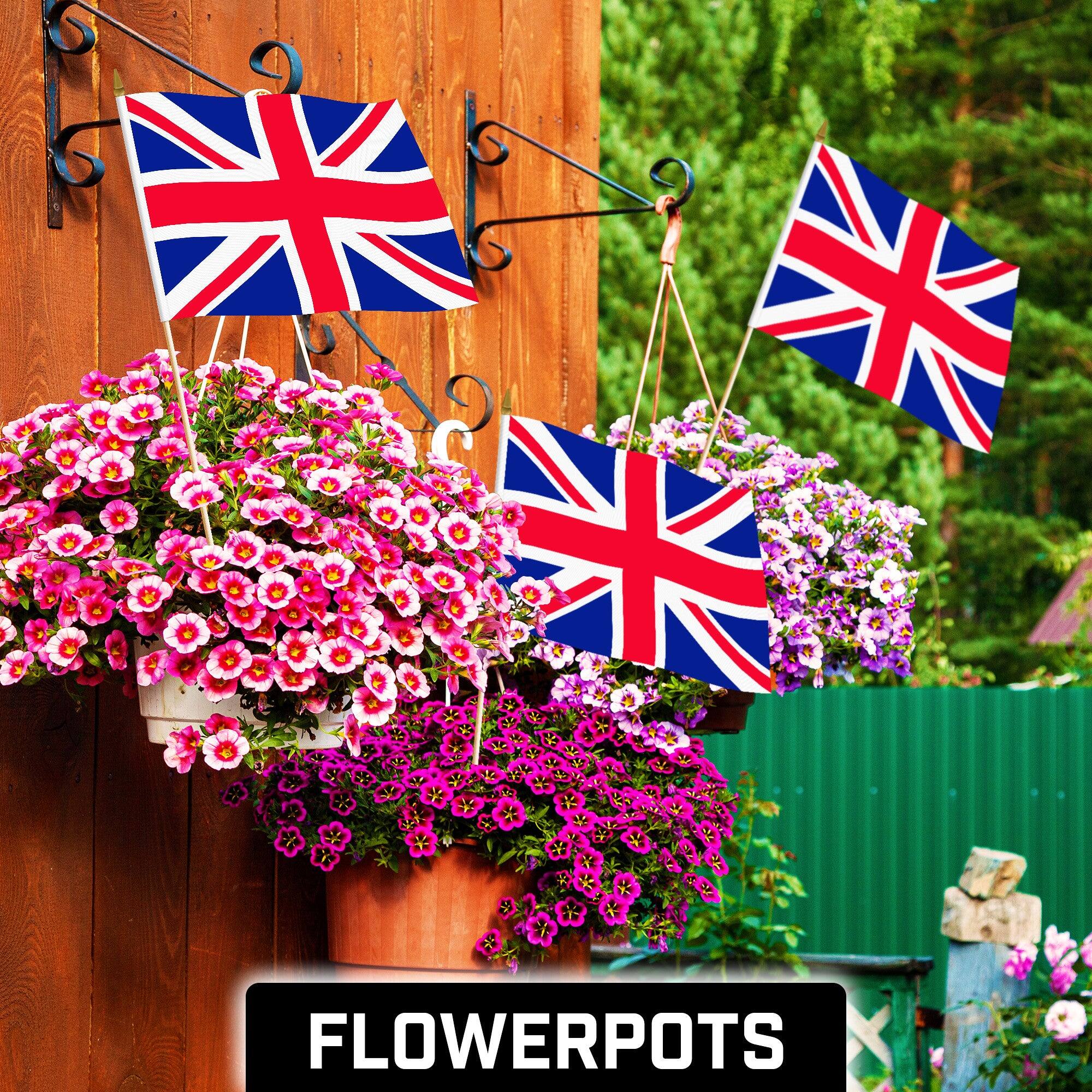 Angle. G128 - 24-Pack United Kingdom Handheld Stick Flags, 12 x 18 in, 150D Polyester. - Assorted Colors.