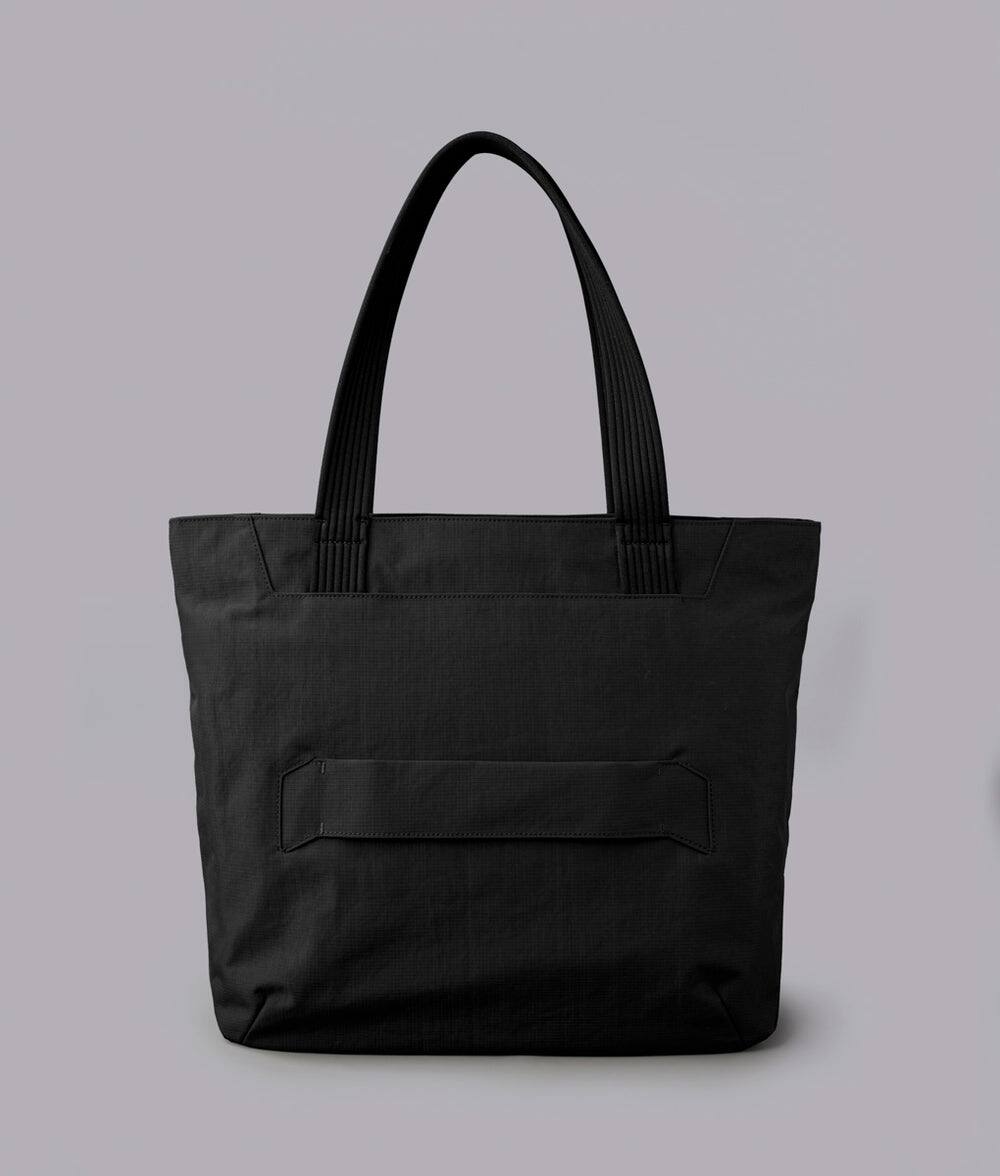 Back. ALPAKA - Flight Tote (L) Laptop Tote Bag for Work, Large Tote Bag Fits 16" MacBook Pro, Water Bottle Pocket, Luggage Pass-Through - Black Axoflux 400D.