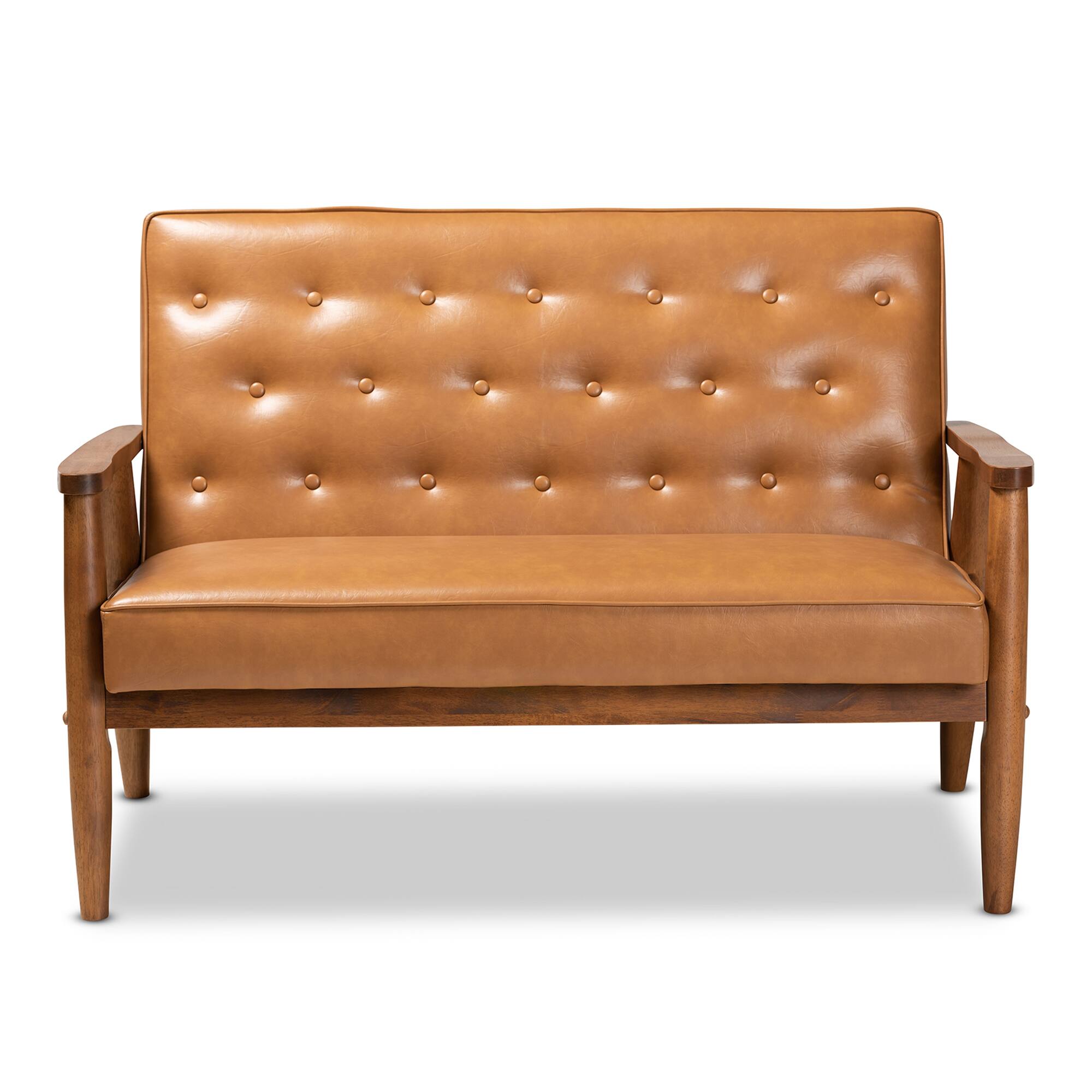 Angle. Baxton Studio - Sorrento Mid-Century Modern Faux Leather Upholstered and Walnut Finished Wood Loveseat - Tan/walnut brown.