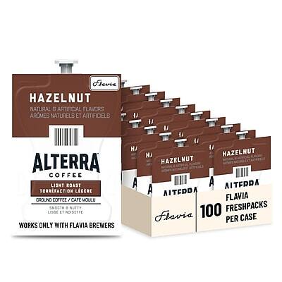 **HAZELNUT**  
NATURAL & ARTIFICIAL FLAVORS  
AROMES NATURELS ET ARTIFICIELS  

**ALTERRA COFFEE**  
LIGHT ROAST  
TORRACTION LÉGÈRE  
GROUND COFFEE / CAFÉ MOULU  

**FLAVIA**  
100 FRESH PACKS PER CASE  

**SMOOTH & NUTTY**  
LISSE ET NUTTETTE  

**WORKS ONLY WITH FLAVIA BREWERS**  

HAZELNUT  
HAZELNUT  
HAZELNUT