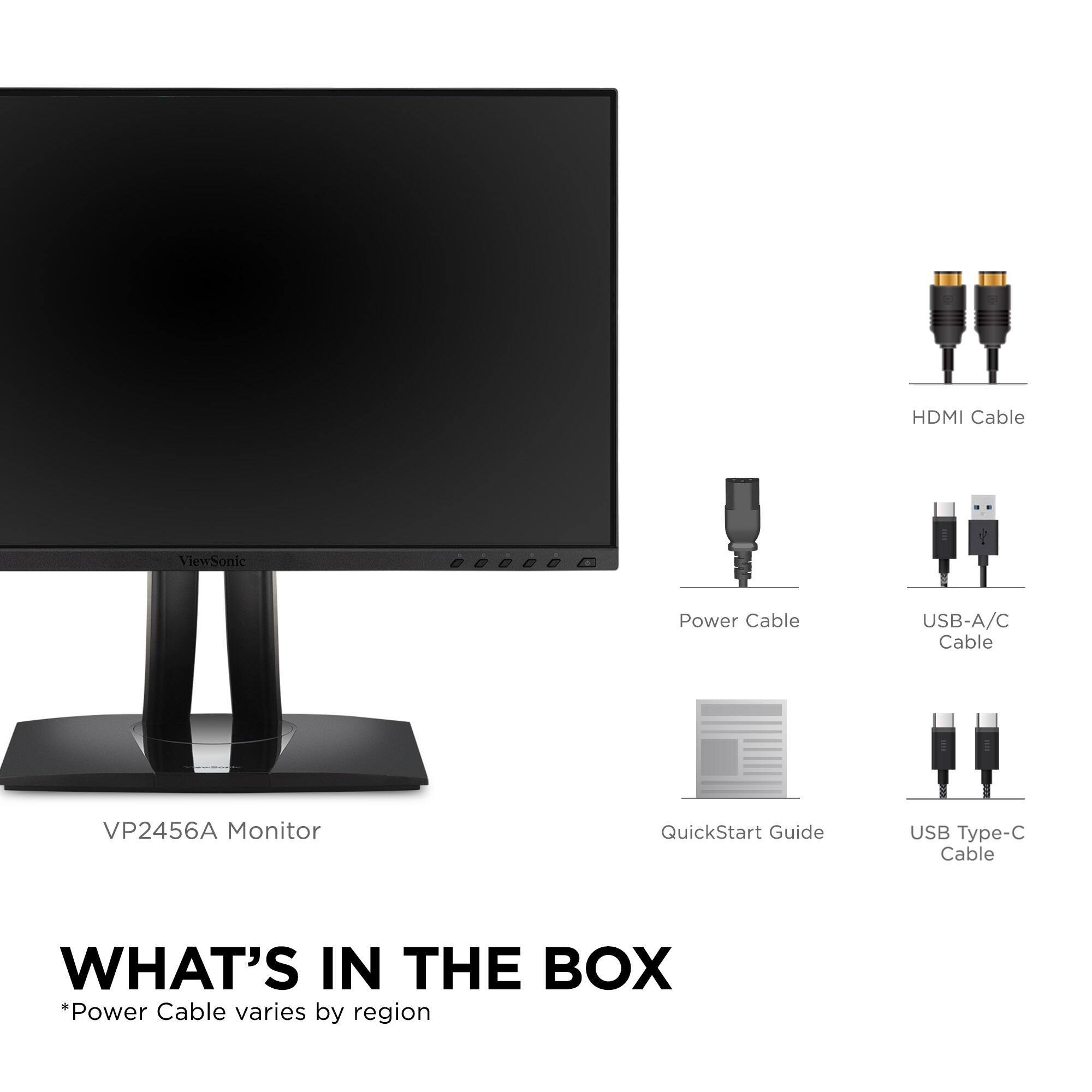 The image shows a computer monitor and its accessories. The monitor is placed on a stand, and there are several cables around it. The text on the image reads: "WHAT'S IN THE BOX *Power Cable varies by region." This indicates that the power cable included with the monitor may differ depending on the region where the monitor is being used.