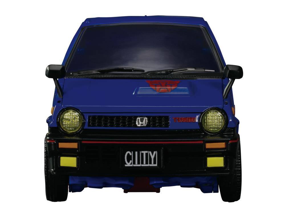 The text on the image reads:

- "CLUTTY" (on the license plate)
- "TURBO" (on the front grille)