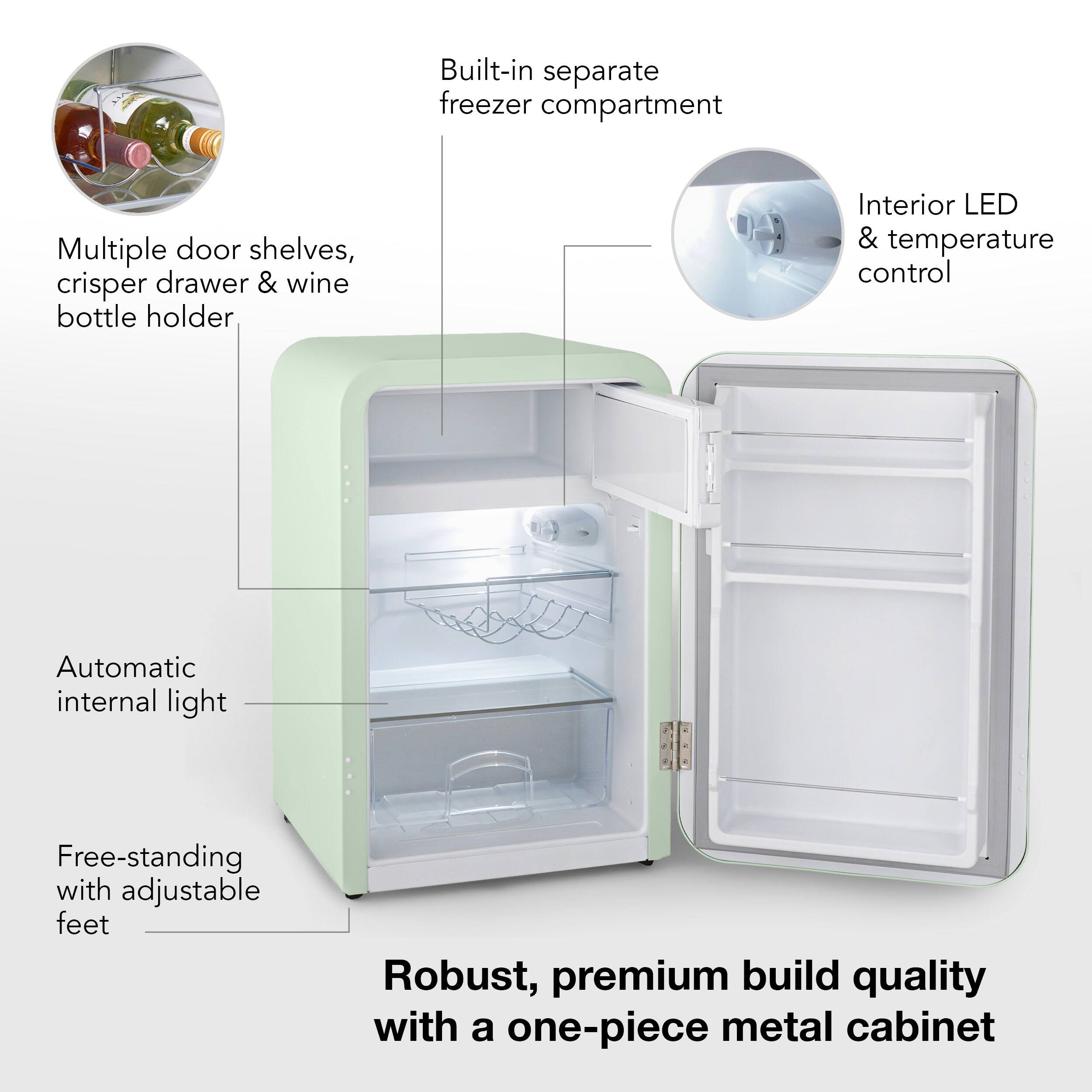 Built-in separate freezer compartment, multiple door shelves, crisper drawer, and wine bottle holder. Interior LED and temperature control. Automatic internal light. Free-standing with adjustable feet. Robust, premium build quality with a one-piece metal cabinet.