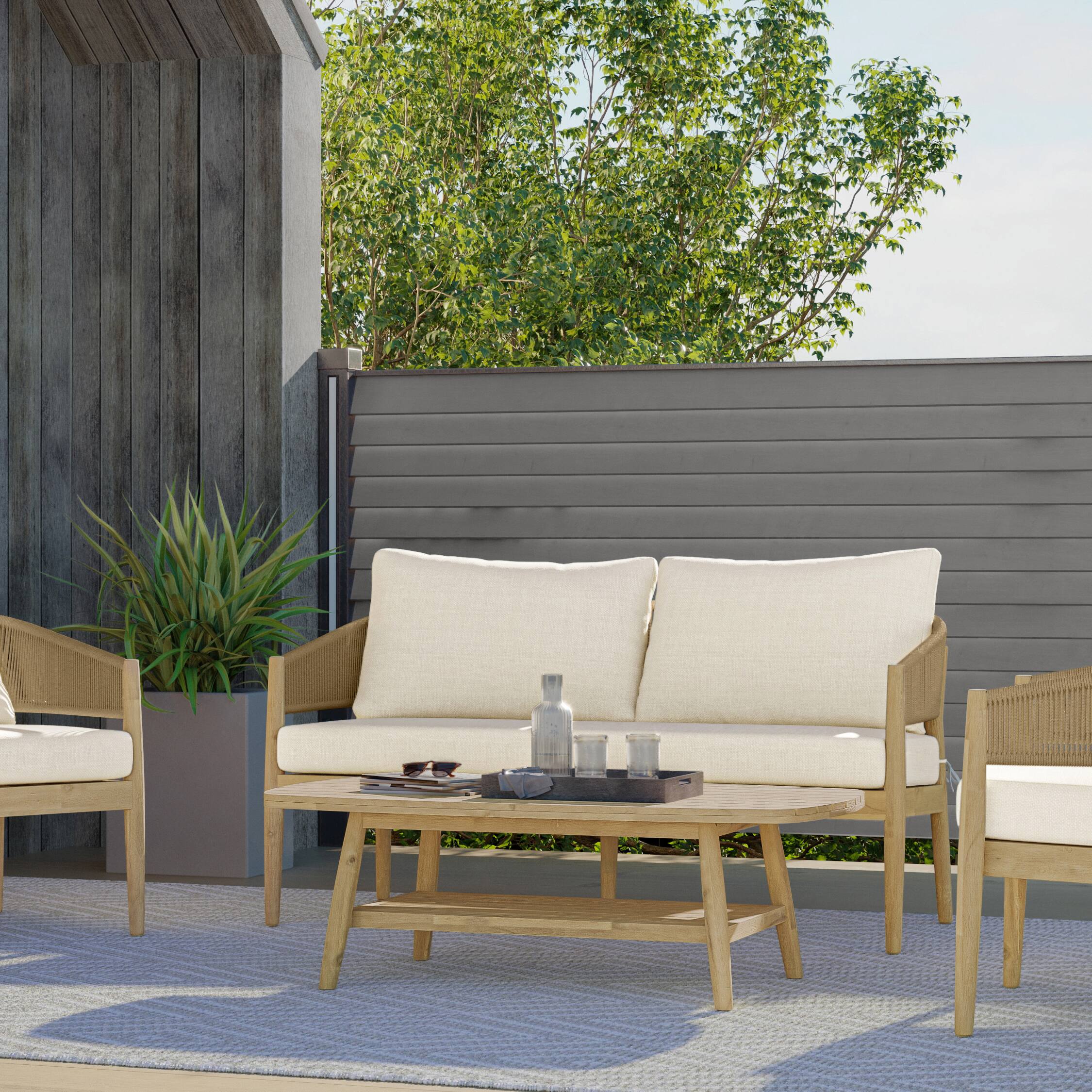 Angle. Simpli Home - Bayshore 59 inch Wide Contemporary Outdoor Sofa in Polyester Fabric, Fully Assembled - Natural.