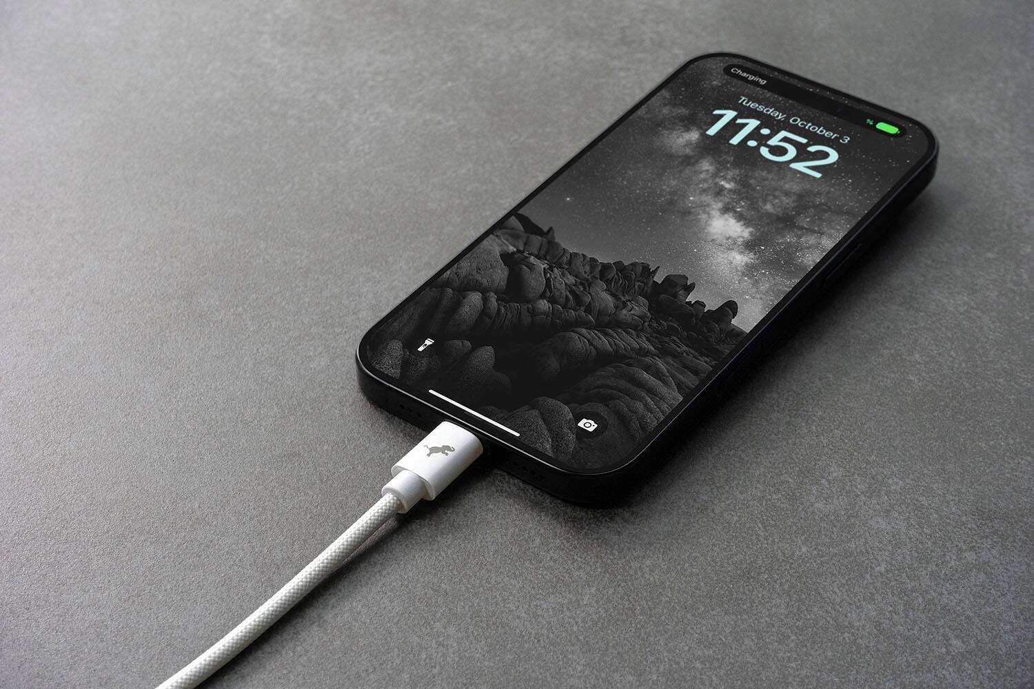 Charging Tuesday, October 3, 11:52.