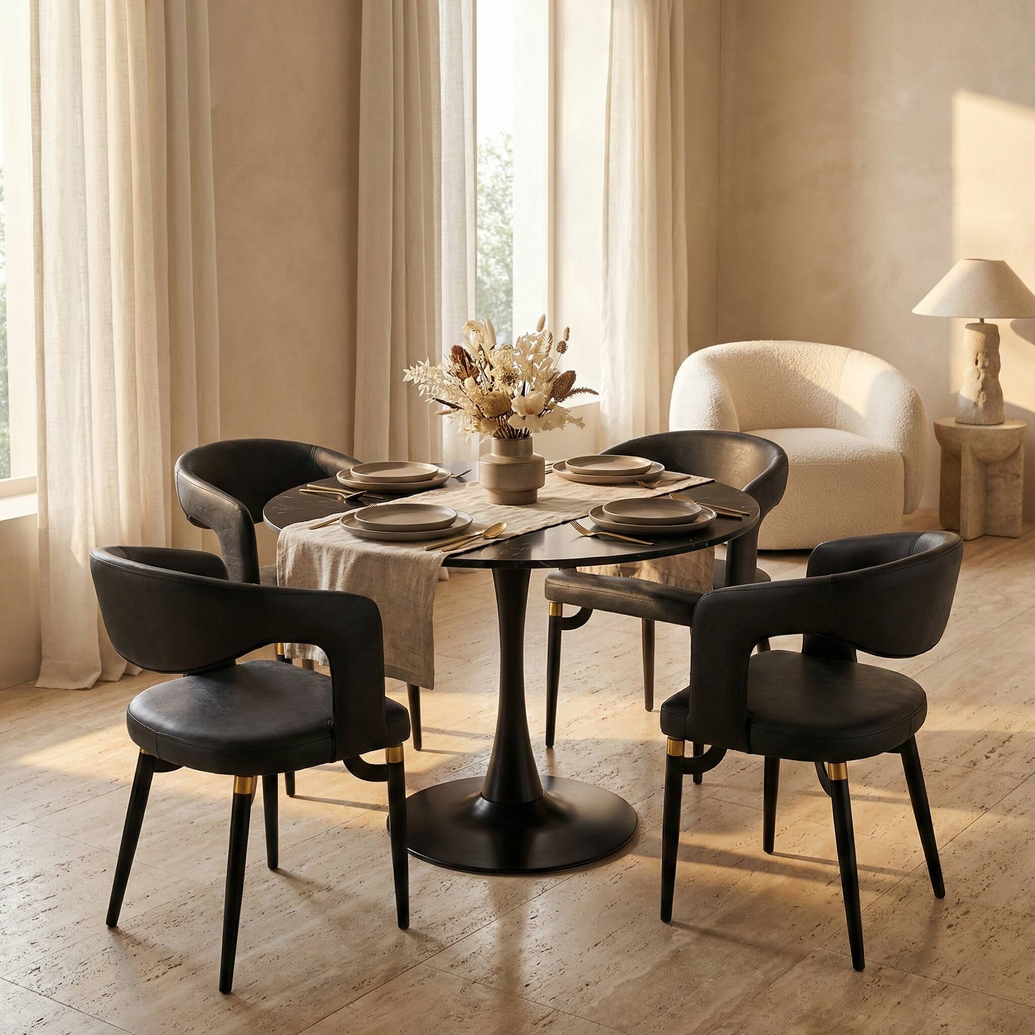 Angle. LeisureMod - Bristol 40" Minimalist Round Pedestal Dining Table - Space-Saving Kitchen Table with Powder-Coated Steel Base - MDF - Marbled Black.
