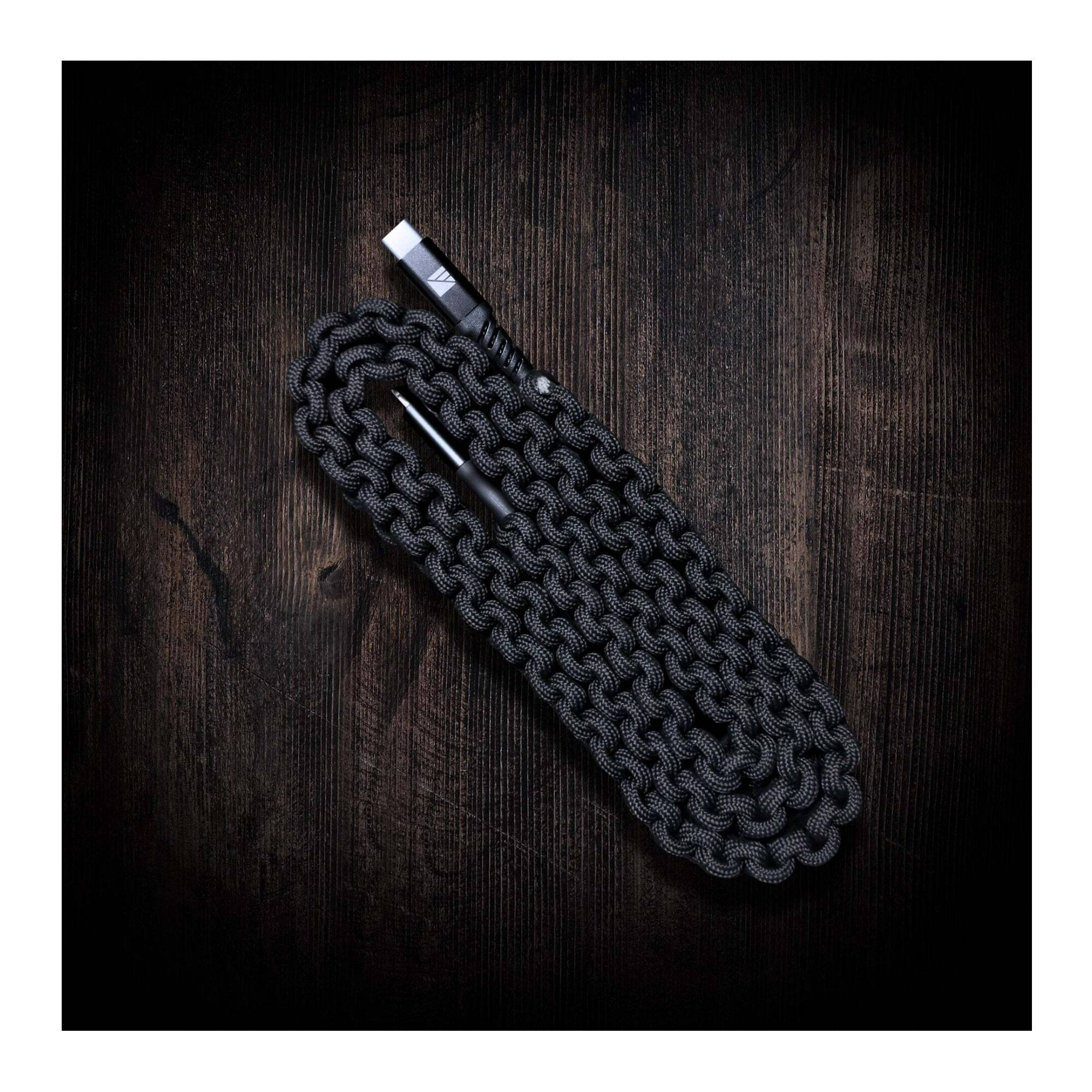 Angle. Dark Energy - Dark Energy 6 Feet Black USB C to USB C Paracord Cable with Leather Strap.