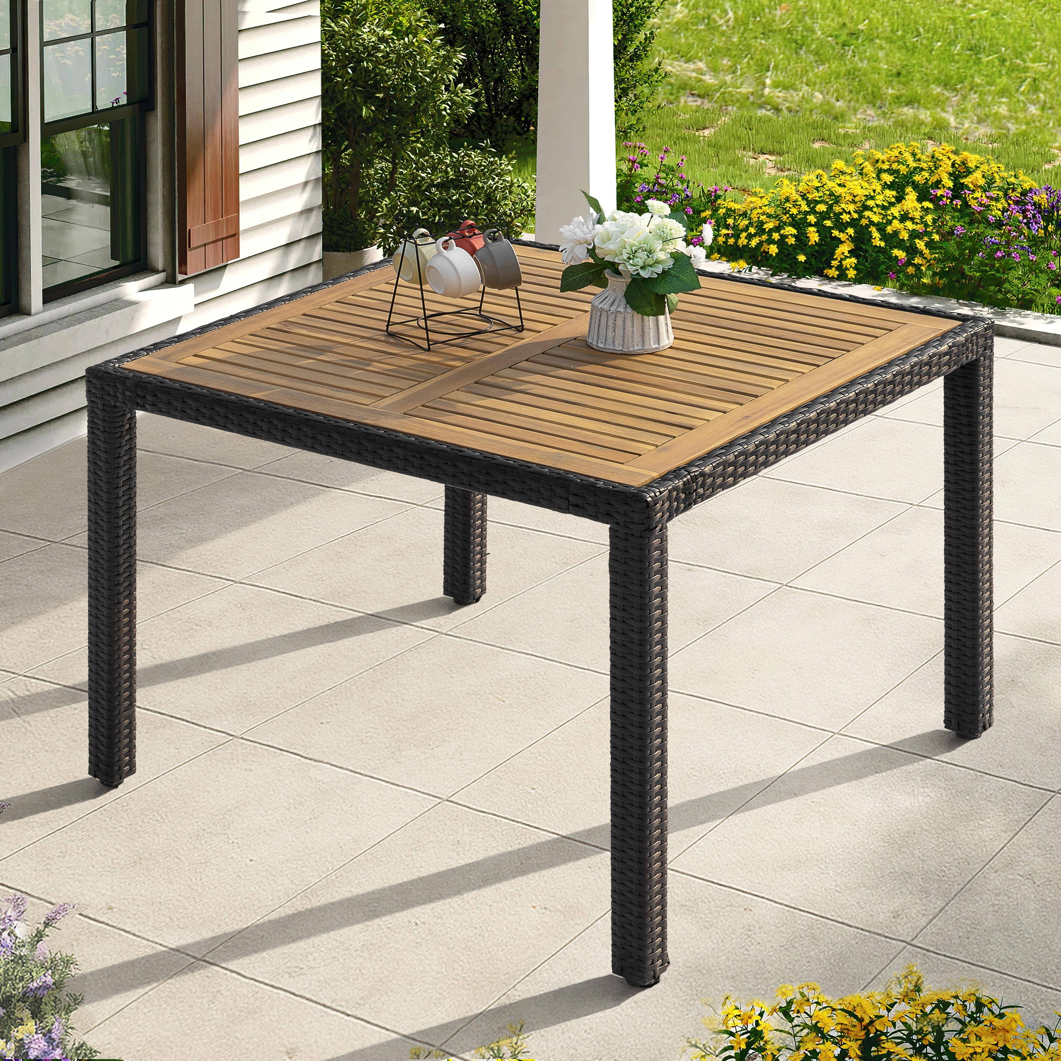 Angle. Nuu Garden - Outdoor Patio 36" Square Dining Table with Acacia Wood Tabletop and PE Rattan-Wrapped Metal Frame - Black.