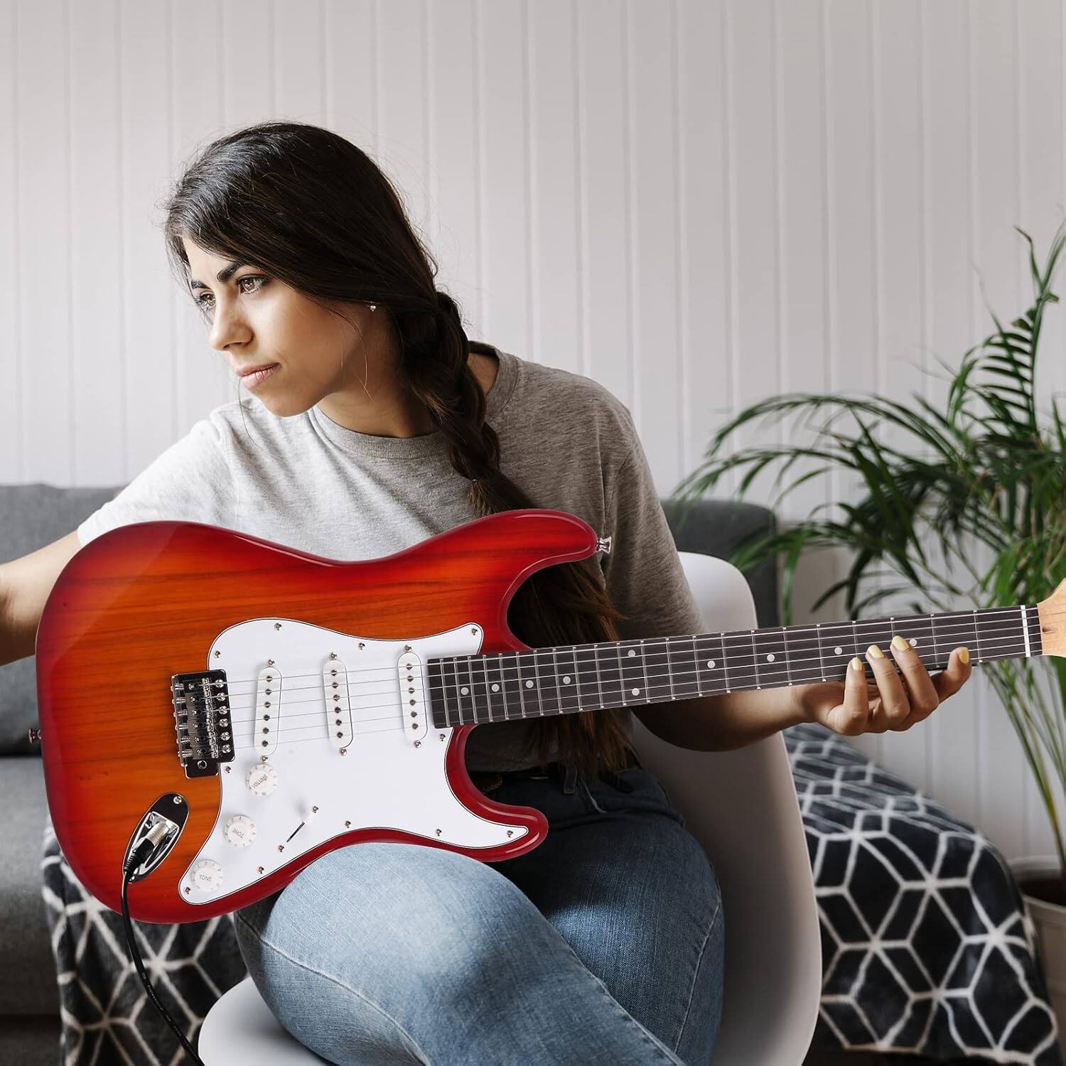 Back. Winado - 39 Inch Electric Guitar, Full-Size Beginner Solid Body Guitar Kit with Gig Bag Strap Tremolo Bar Cable Picks - Sunset Red.