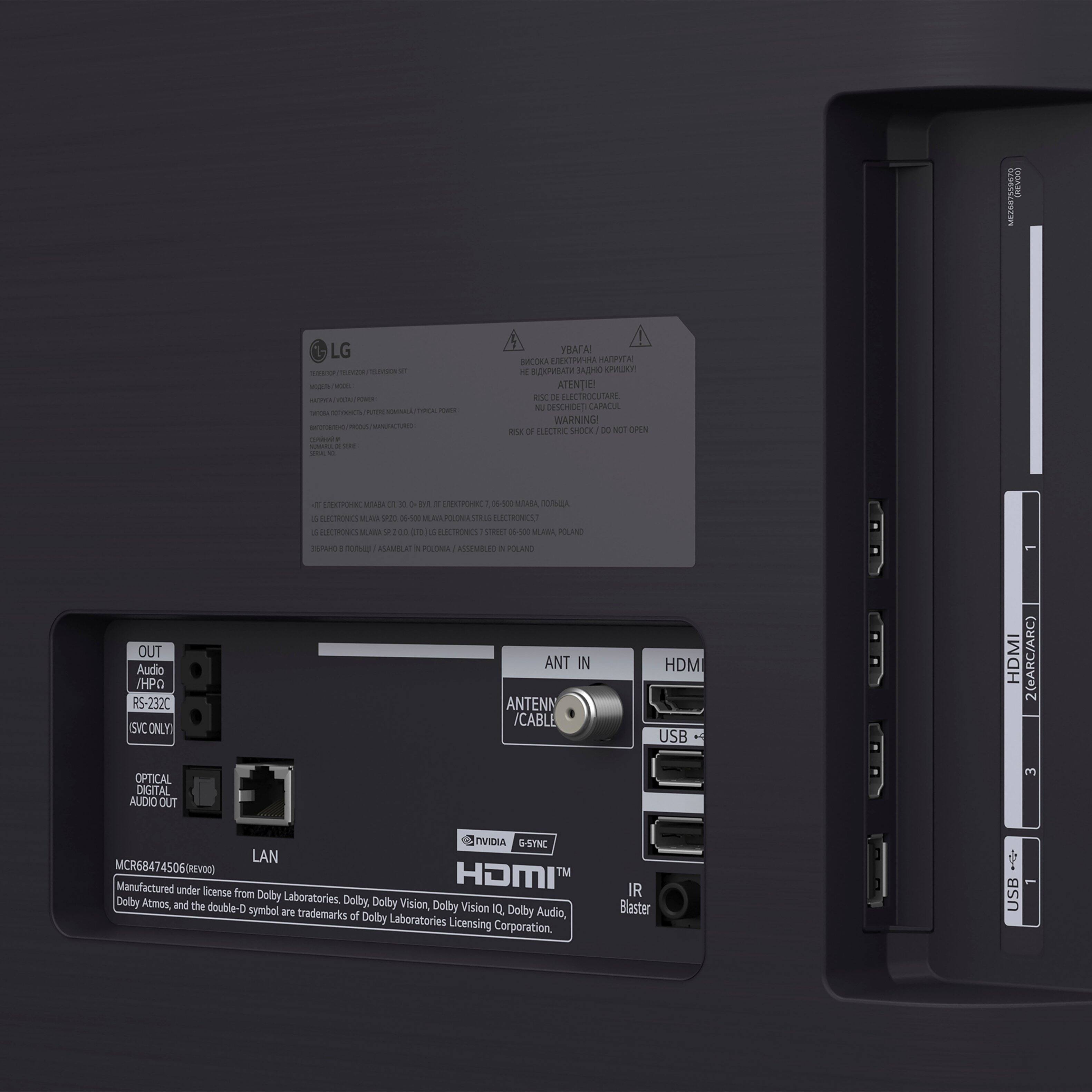 The image shows a close-up of a device with a sticker that says "HDMI." The device has a USB port and an HDMI port, as well as a warning sticker that says "Do not open." The device is manufactured under a license from Dolby Laboratories.