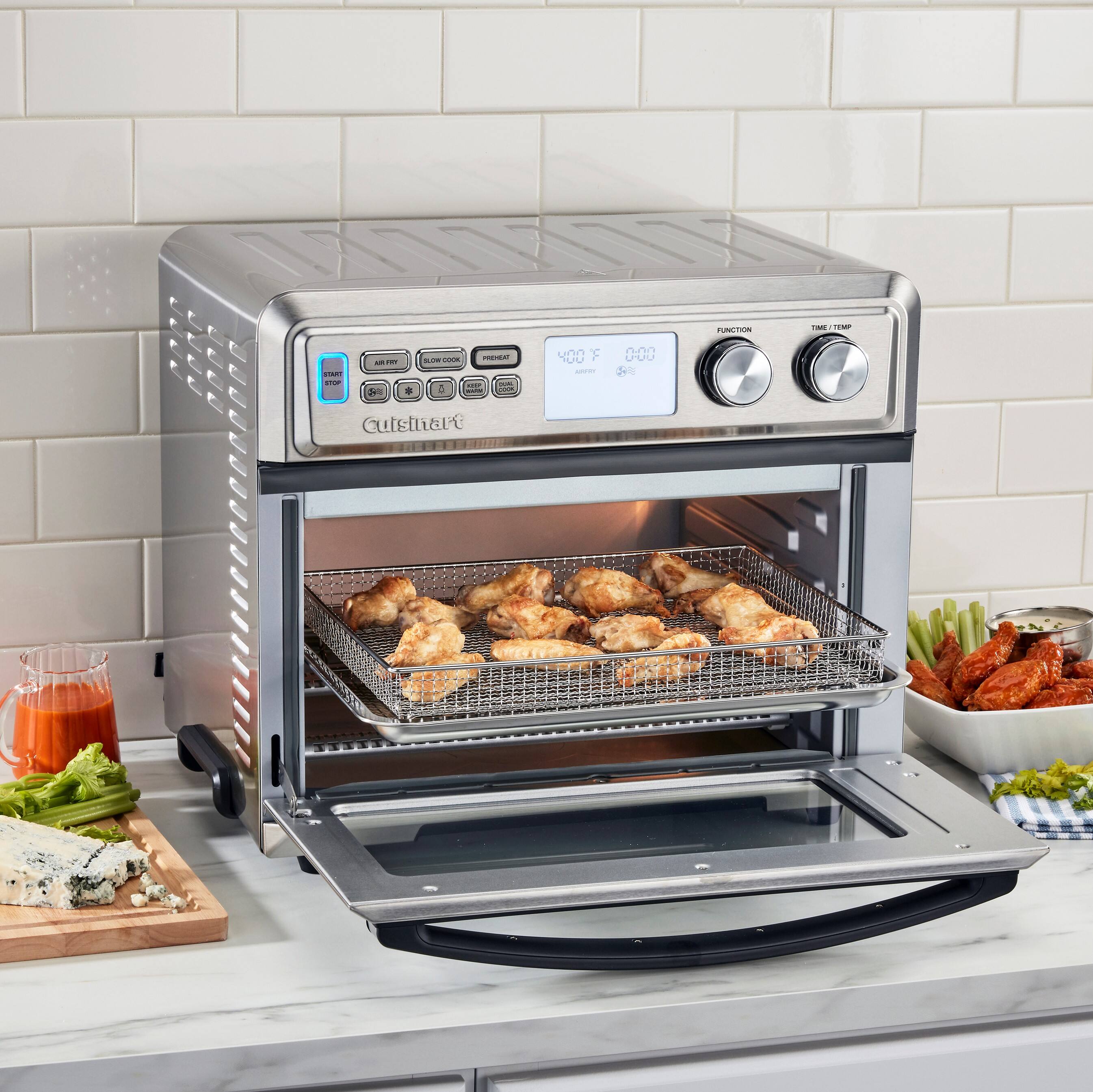 "Cuisinart" is the name of the brand of the toaster oven in the image.