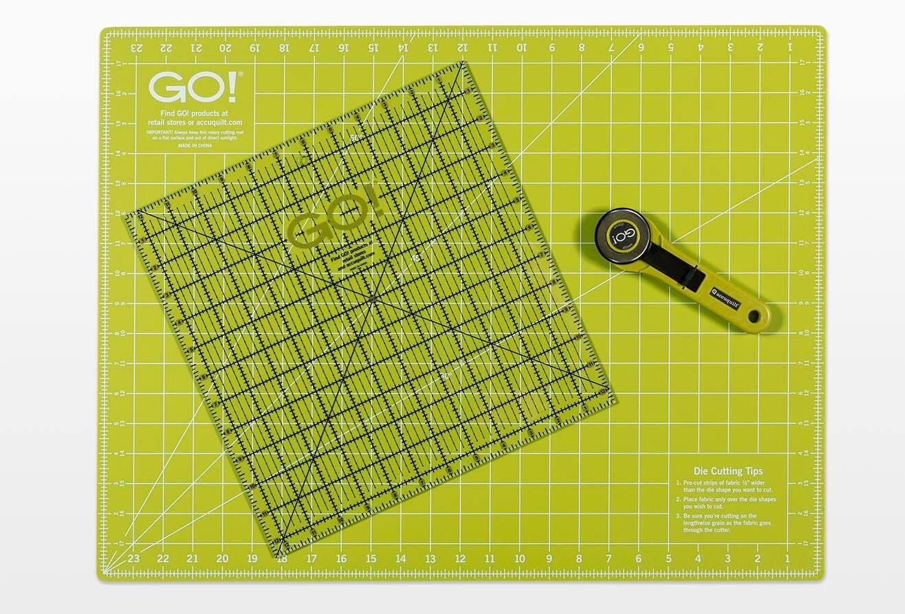 **GO!**

Find GO! products at retail stores or accuquilt.com

IMPORTANT: Always use a rotary cutter with a sharp blade. Do not use a utility knife or scissors. Use a rotary cutter with a 45-degree blade for best results. Do not use a rotary cutter with a 90-degree blade. Do not use a rotary cutter with a 180-degree blade. Do not use a rotary cutter with a 270-degree blade. Do not use a rotary cutter with a 360-degree blade. Do not use a rotary cutter with a 450-degree blade. Do not use a rotary cutter with a 540-degree blade. Do not use a rotary cutter with a 630-degree blade. Do not use a rotary cutter with a 720-degree blade. Do not use a rotary cutter with a 810-degree blade. Do not use a rotary cutter with a 900-degree blade. Do not use a rotary cutter with a 990-degree blade. Do not use a rotary cutter with a 1080-degree blade. Do not use a rotary cutter with a 1170-degree blade. Do not use a rotary cutter
