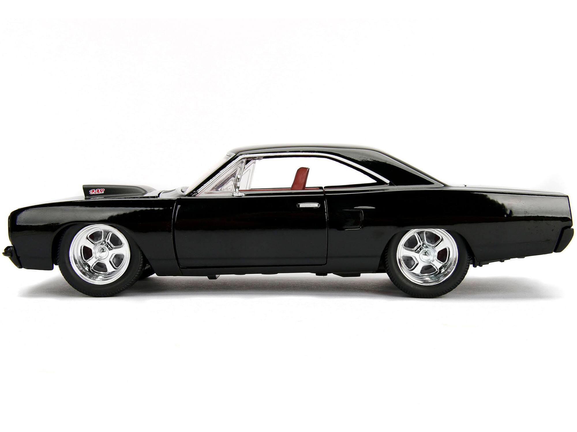 Left. Jada - 1970 Plymouth Road Runner 440 Black with Red Interior "Bigtime Muscle" Series 1/24 Diecast Model Car by Jada - Black And Red.