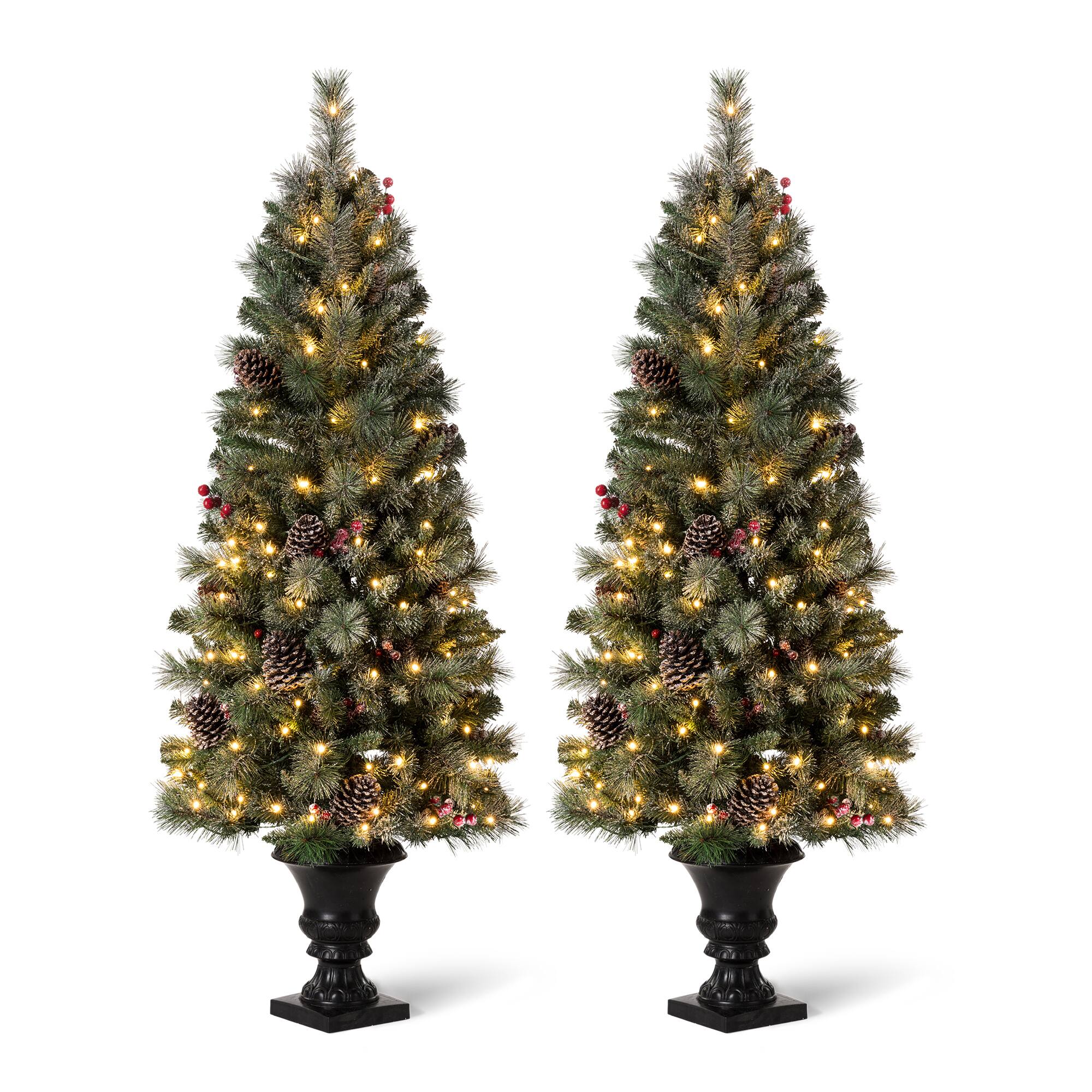 Angle. Glitzhome - Set of Two 5ft Pre-Lit Flocked Pine Artificial Christmas Porch Tree with 130 Warm White Lights - White.