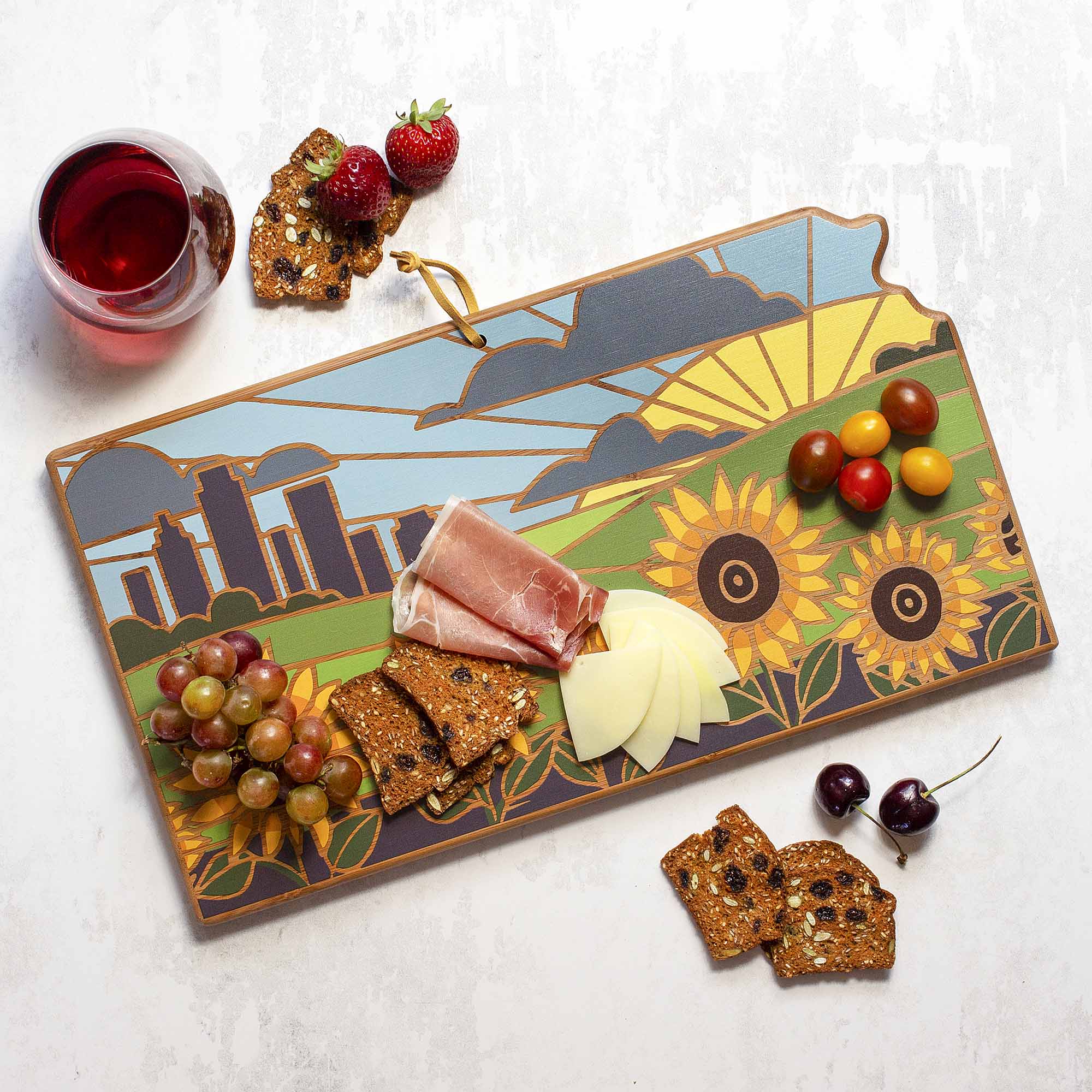 Angle. Totally Bamboo - Kansas Cutting Board with Artwork by Summer Stokes.