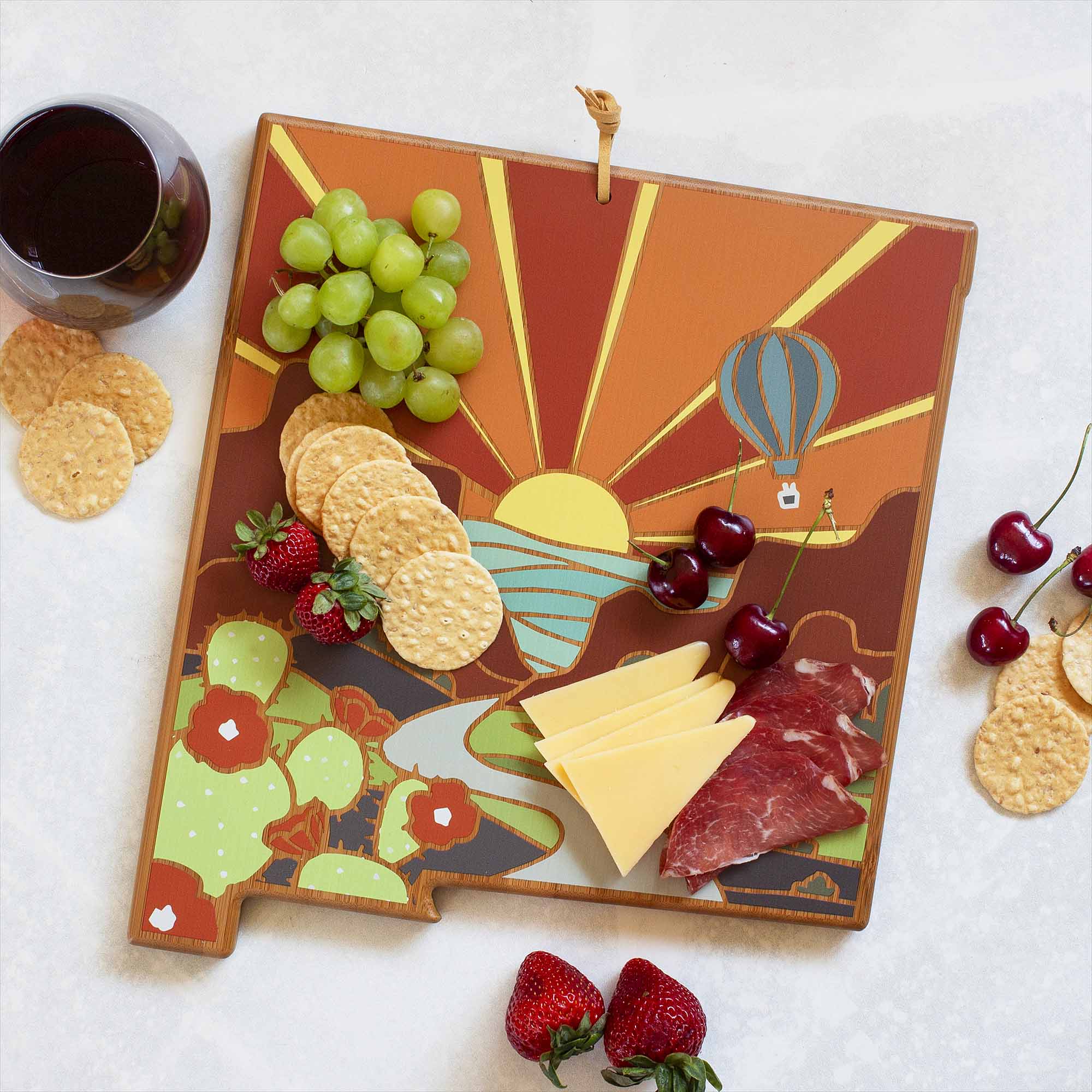 Angle. Totally Bamboo - New Mexico Cutting Board with Artwork by Summer Stokes.