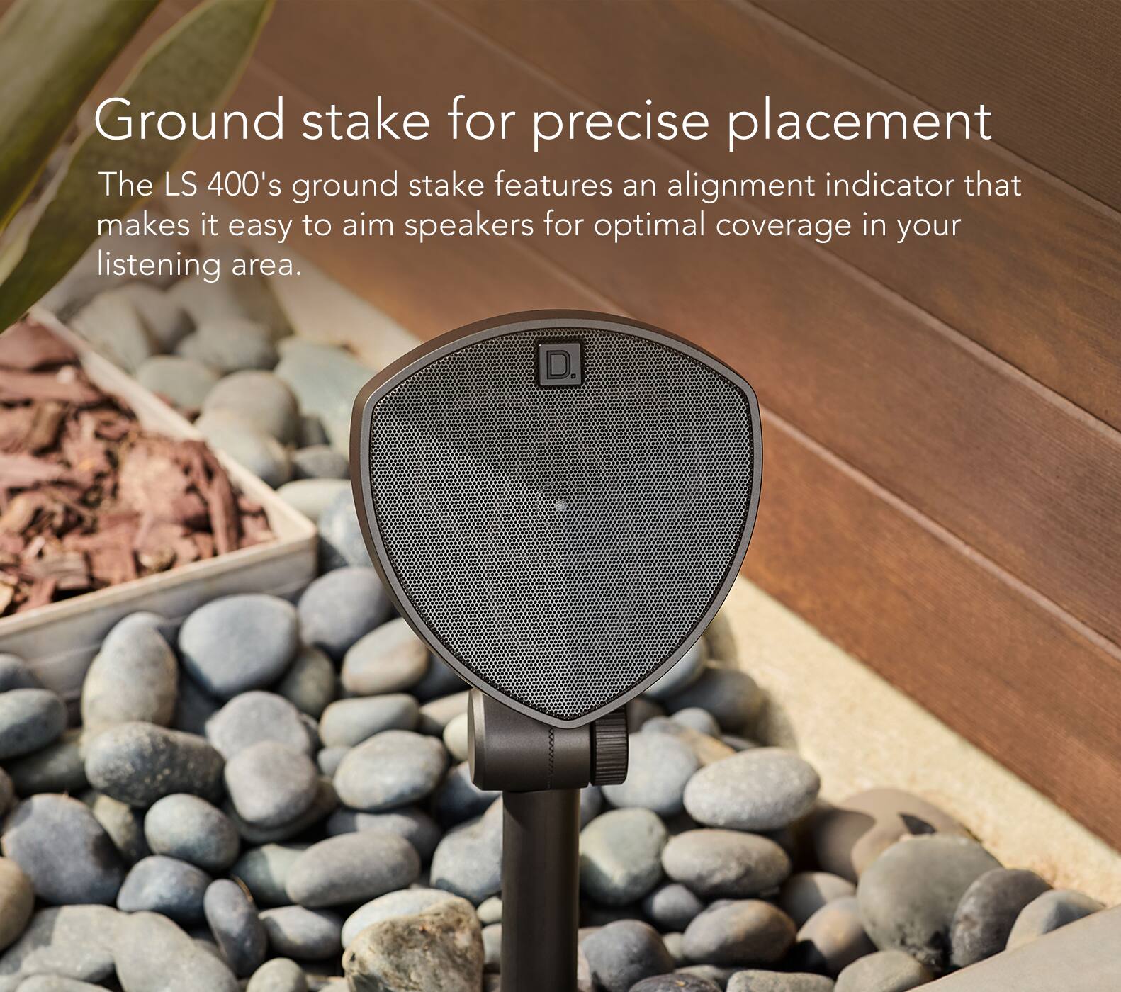 The LS 400's ground stake is designed for precise placement, featuring an alignment indicator that helps aim speakers for optimal coverage in your listening area.