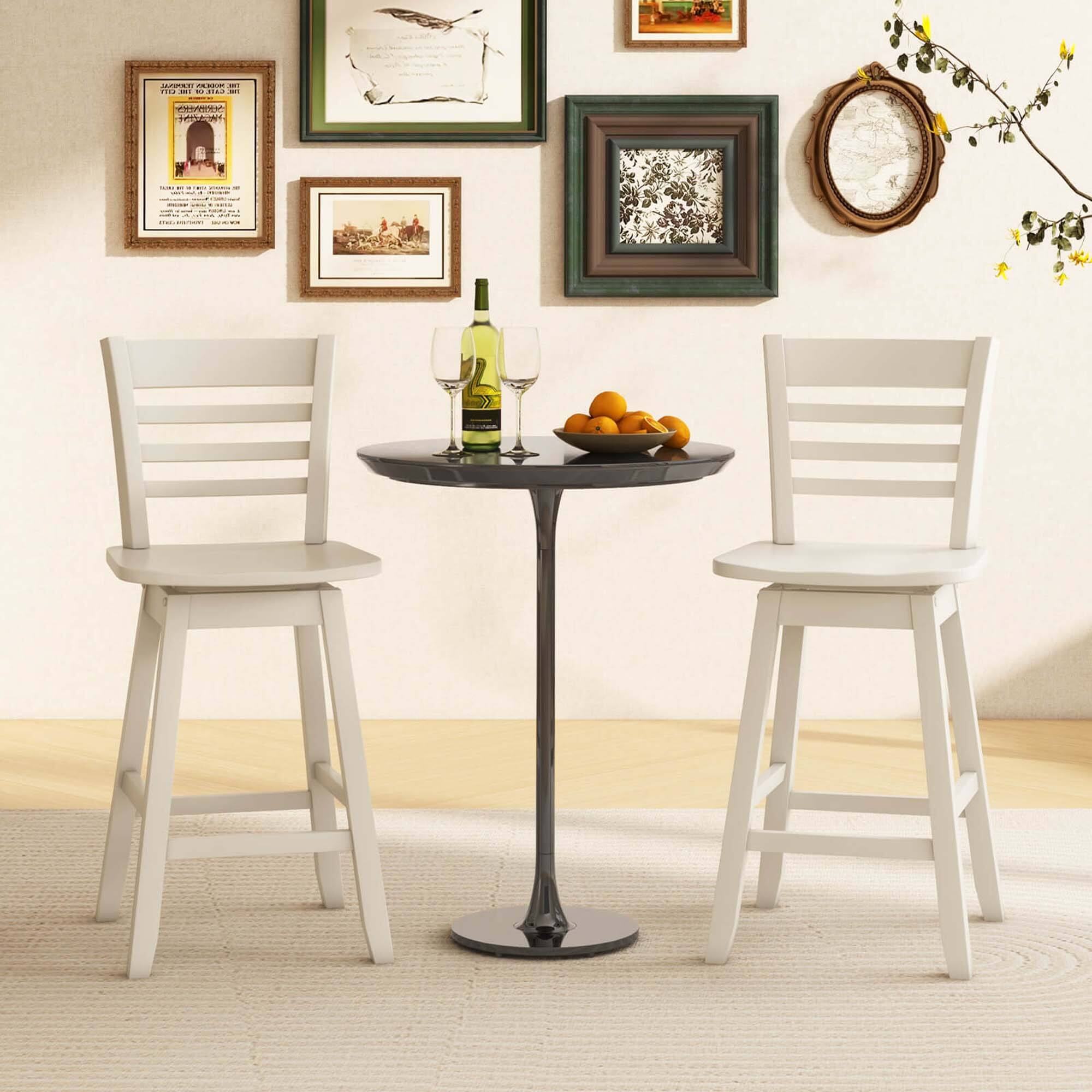 The text on the image reads "AME CO- M .L. - - ses - I EY TSAA : 1 - : : :". This text seems to be unrelated to the scene, which features a table with two white chairs, a bottle of wine, and some oranges. It is unclear what the meaning or purpose of this text is, but it does not provide any context or information about the image.