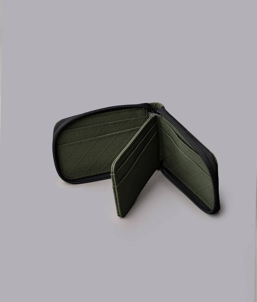 Angle. ALPAKA - Zip ID Wallet with ID Window, RFID Protection, Holds 10+ Cards, Zip-Around Closure, Gift-Ready Box - Green Axogrid 210D.