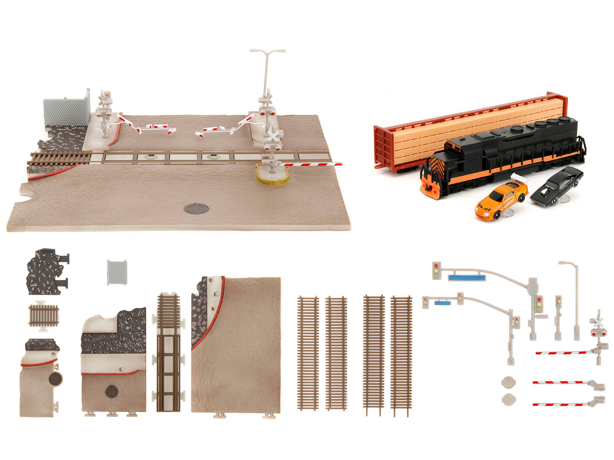 Back. Jada - "Fast & Furious" Final Race Diorama with Toyota Supra Orange and Dodge Charger Black "Nano Scene" Series model by Jada - Supra Orange And Black.