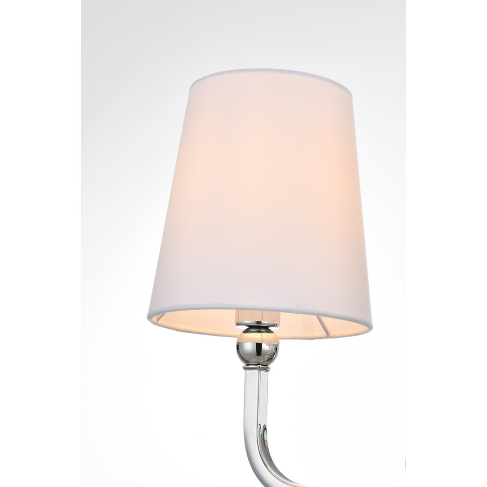 Left. Living District - Colson 3 light Chrome and Clear Bath Sconce - Chrome And Clear.