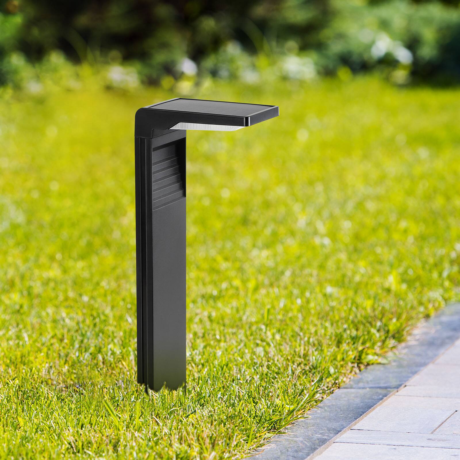 Back. Oumilen - 2-Pack 16.14In Solar Pathway Lights White LED L-Shaped Outdoor Stake Lights.