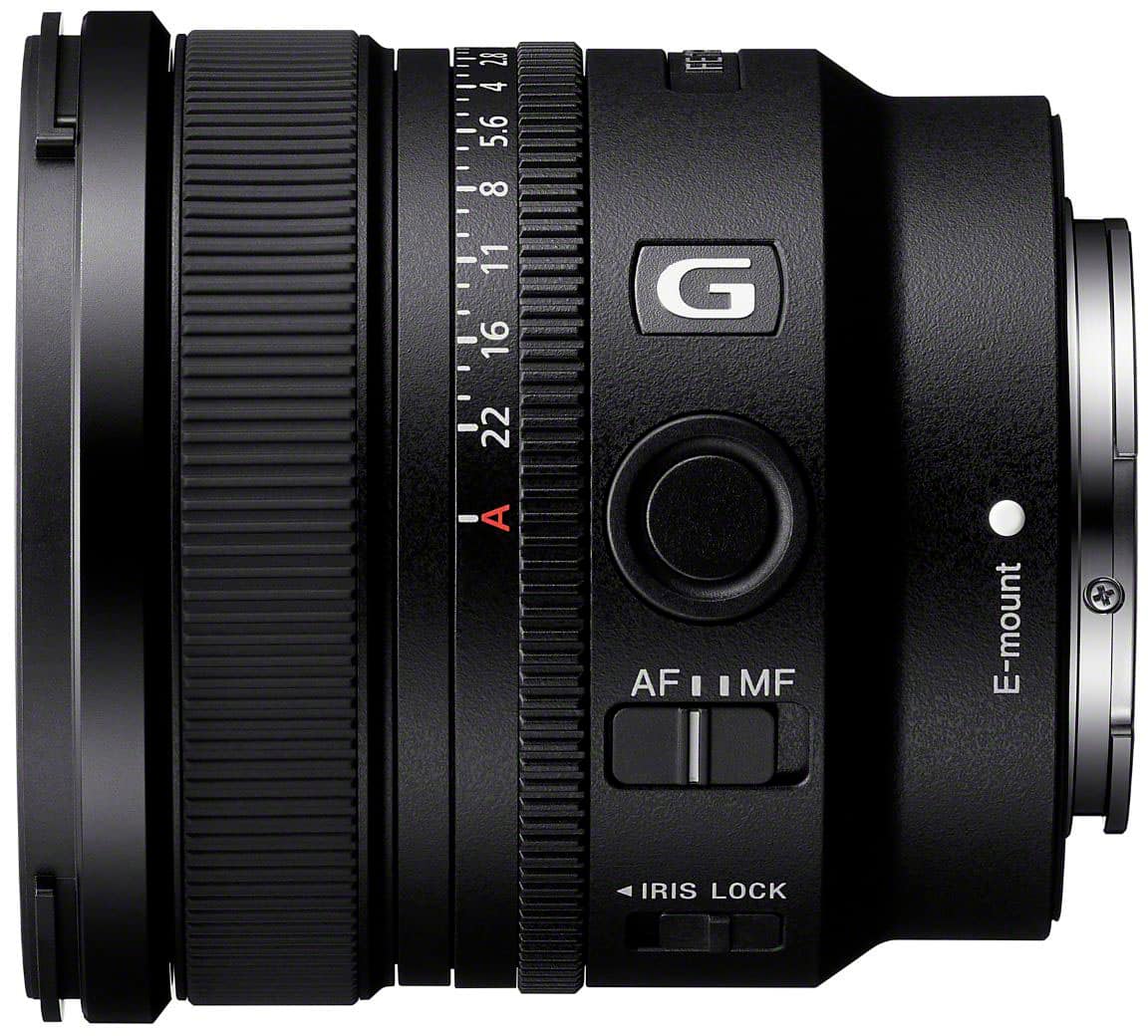 The text on the image reads: "21 4 FL 5.6 8 11 16 G 22 - A AF I I MF E-mount K IRIS LOCK." This text is grouped as follows:
1. "21 4 FL 5.6 8 11 16 G 22 - A AF I I MF E-mount K IRIS LOCK"
The text describes the features of a camera lens, including the focal length, aperture, and other specifications.