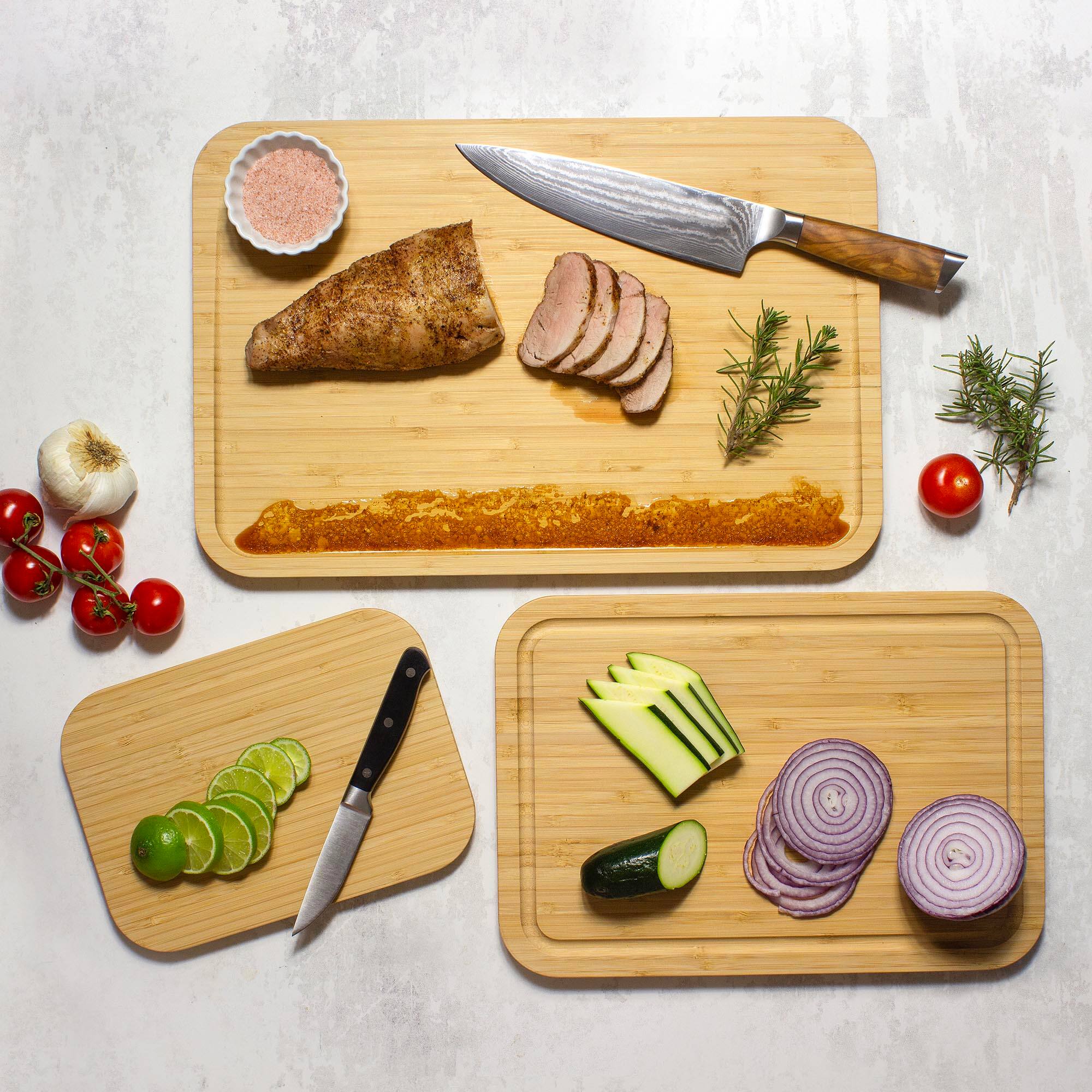 Angle. Totally Bamboo - 3-Piece Cutting Board Set with Juice Grooves.