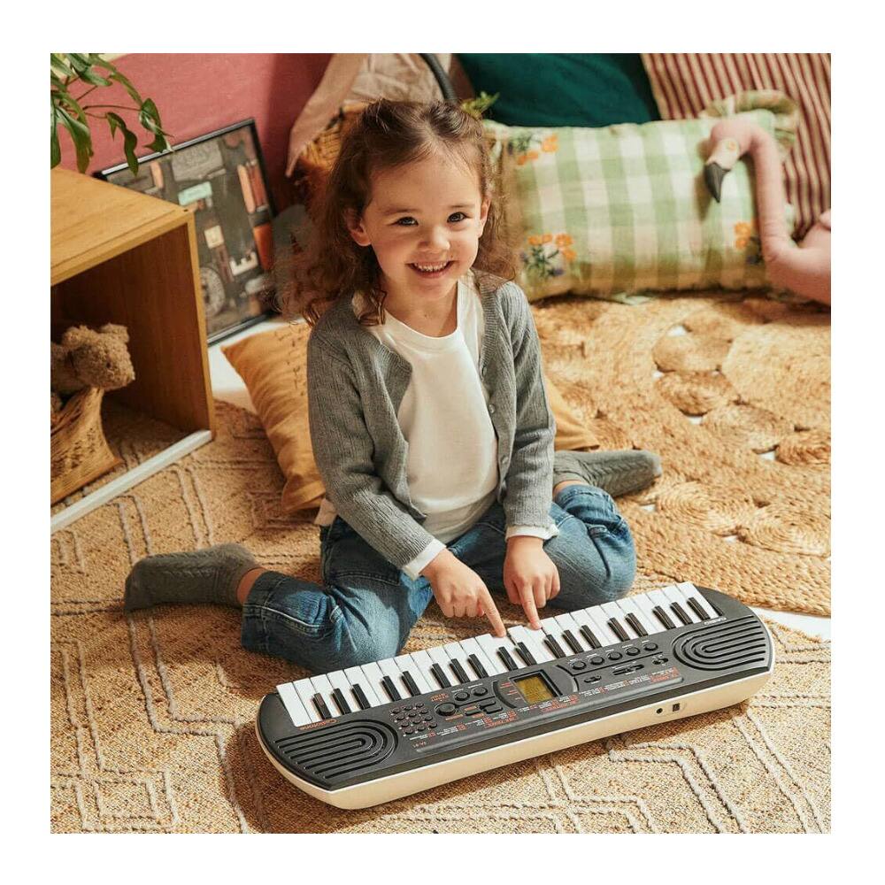 Angle. Casio - Casio Casiotone SA-81 Compact Keyboard 44 key with 100 Tones and 50 Rhythms.