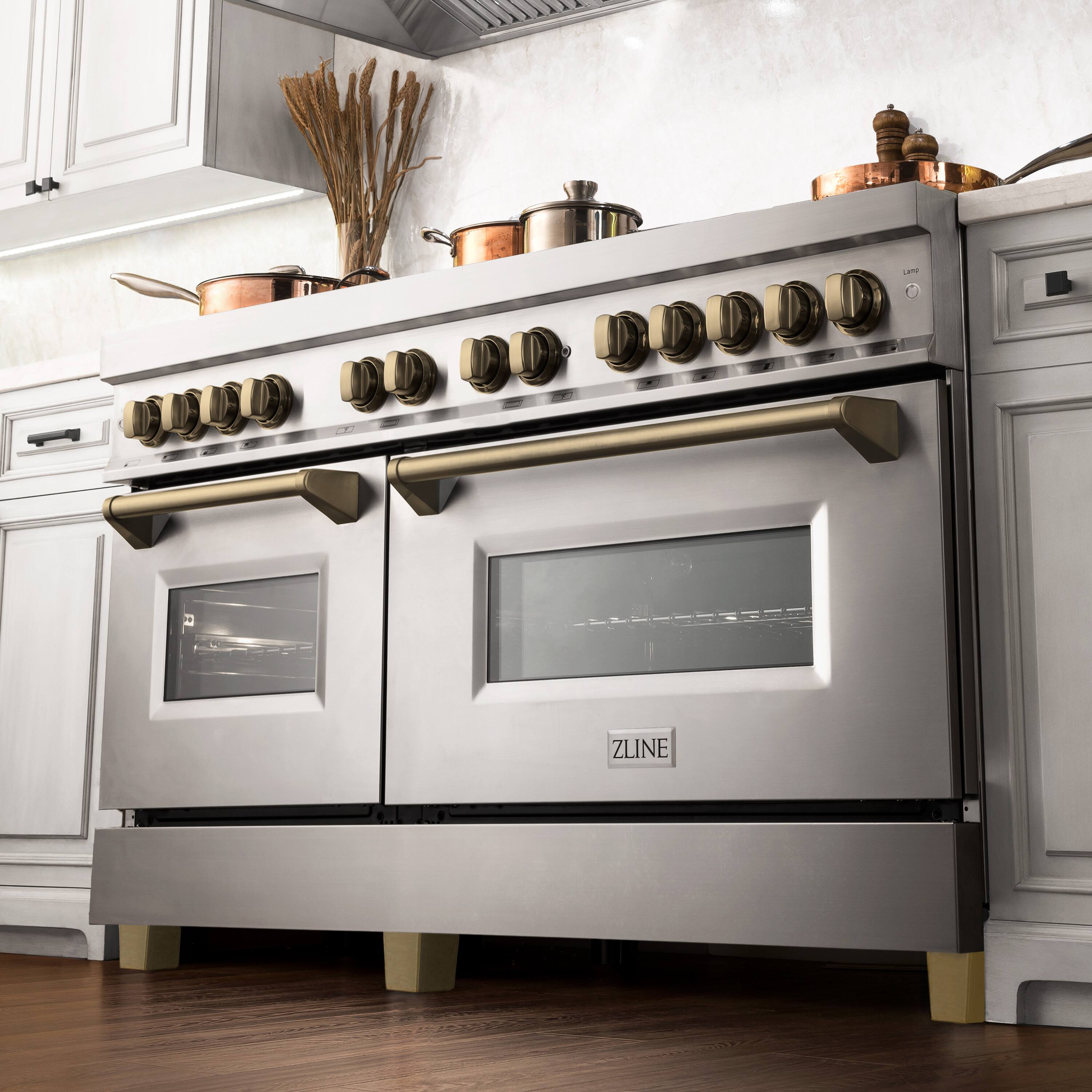 The image features a stainless steel kitchen with a double oven and a stove top. The oven has a digital display and is made by ZLINE. The stove top has six burners, and there are several pots and pans on the stove. The kitchen also has a sink and a refrigerator, making it a complete and functional space.