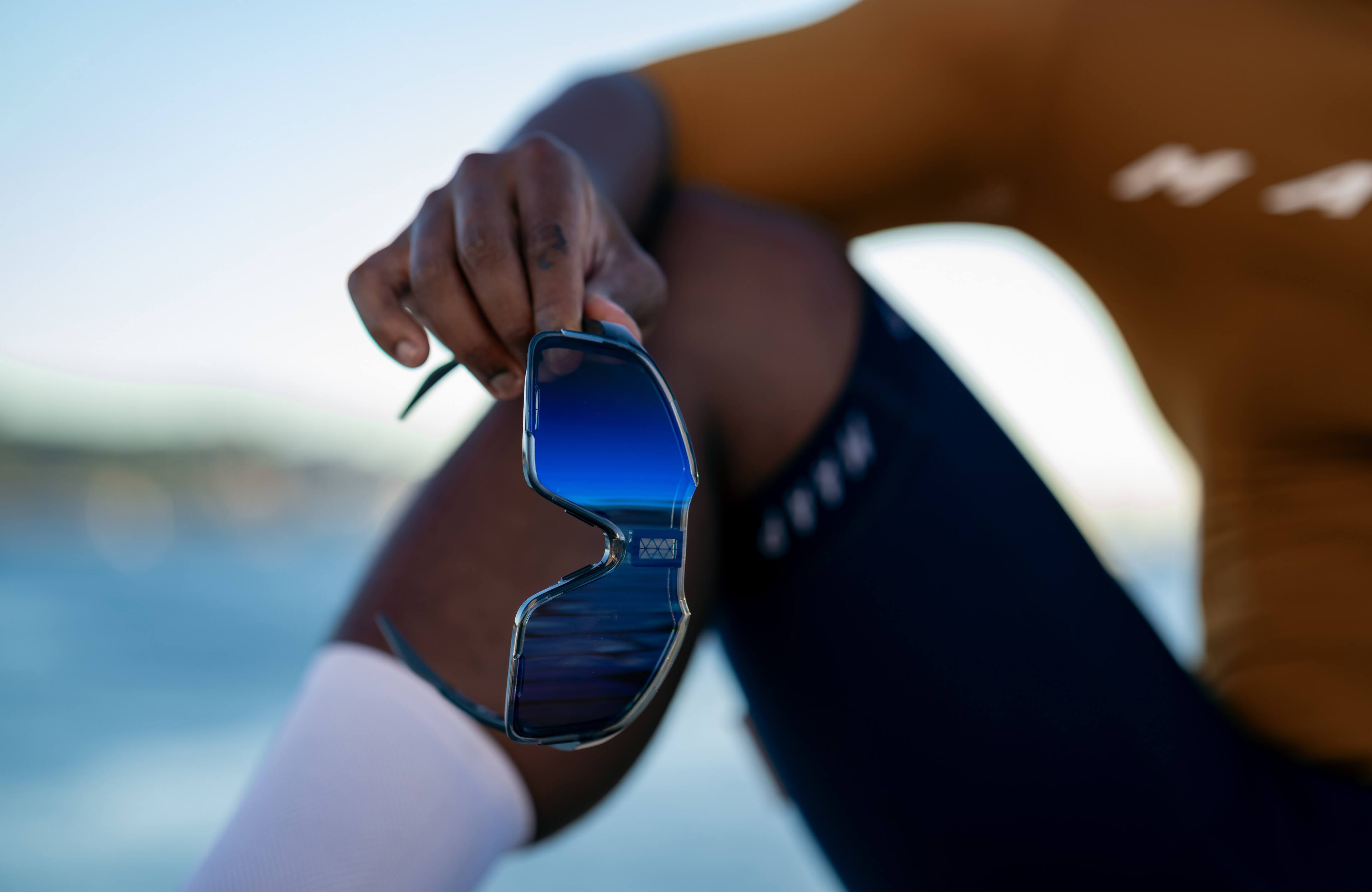 Alt View 2. Chamelo - Falcon - Sports Smart Glasses with Electrochromic Auto Tint - Obsidian frame | Alpha Blue lenses.