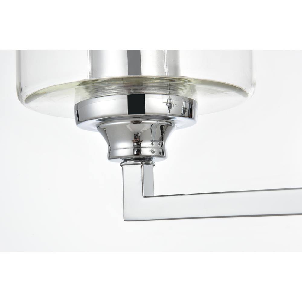 Left. Living District - Mayson 4 light Chrome and Clear Bath Sconce - Chrome And Clear.