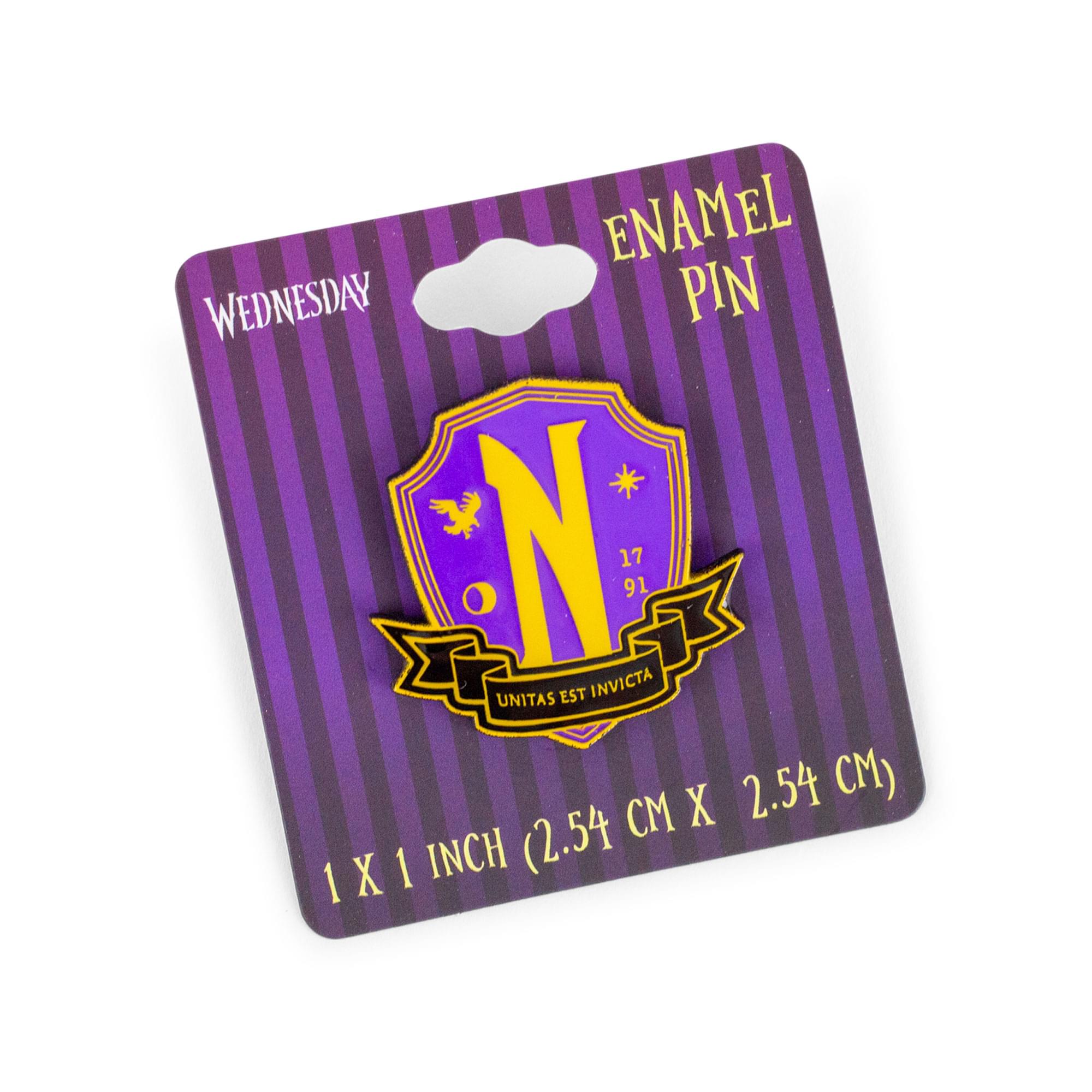 ENAMEL PIN  
WEDNESDAY  

N  
17 91  
UNITAS EST INVICTA  

1 X 1 INCH (2.54 CM X 2.54 CM)