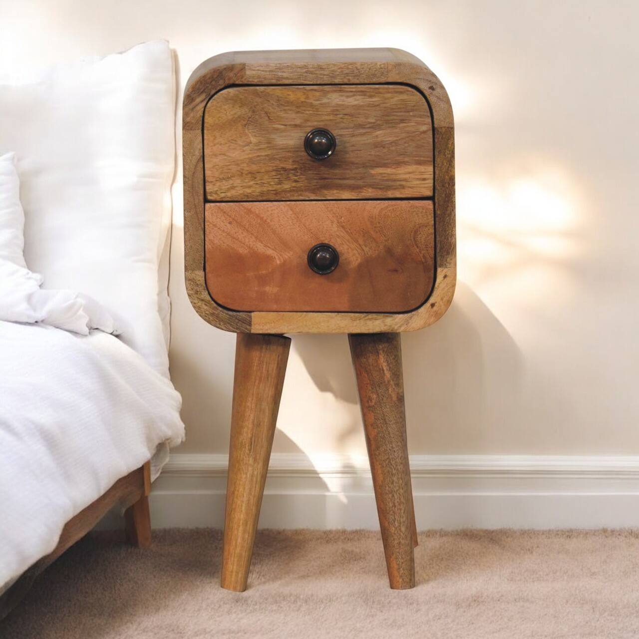 Angle. Artisan Furniture - Artisan Furniture Solid Wood Extra Mini Curved Oak-ish Bedside, 2 Drawers, Nordic Legs, Light Brown - Oak.