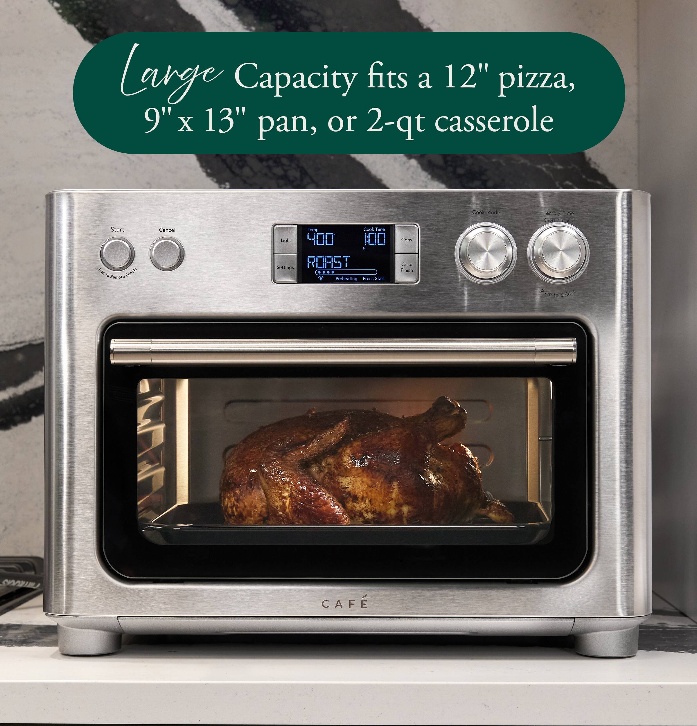 Large Capacity fits a 12" pizza, 9" x 13" pan, or 2-qt casserole

Cook-Made
Start www. Rencle Crable
Cancel
Temp Cook are Light 100 100 R ROAST Settings .... Prehesting Press Staft
City Crisp Frish
SYNOUILI
CAFE