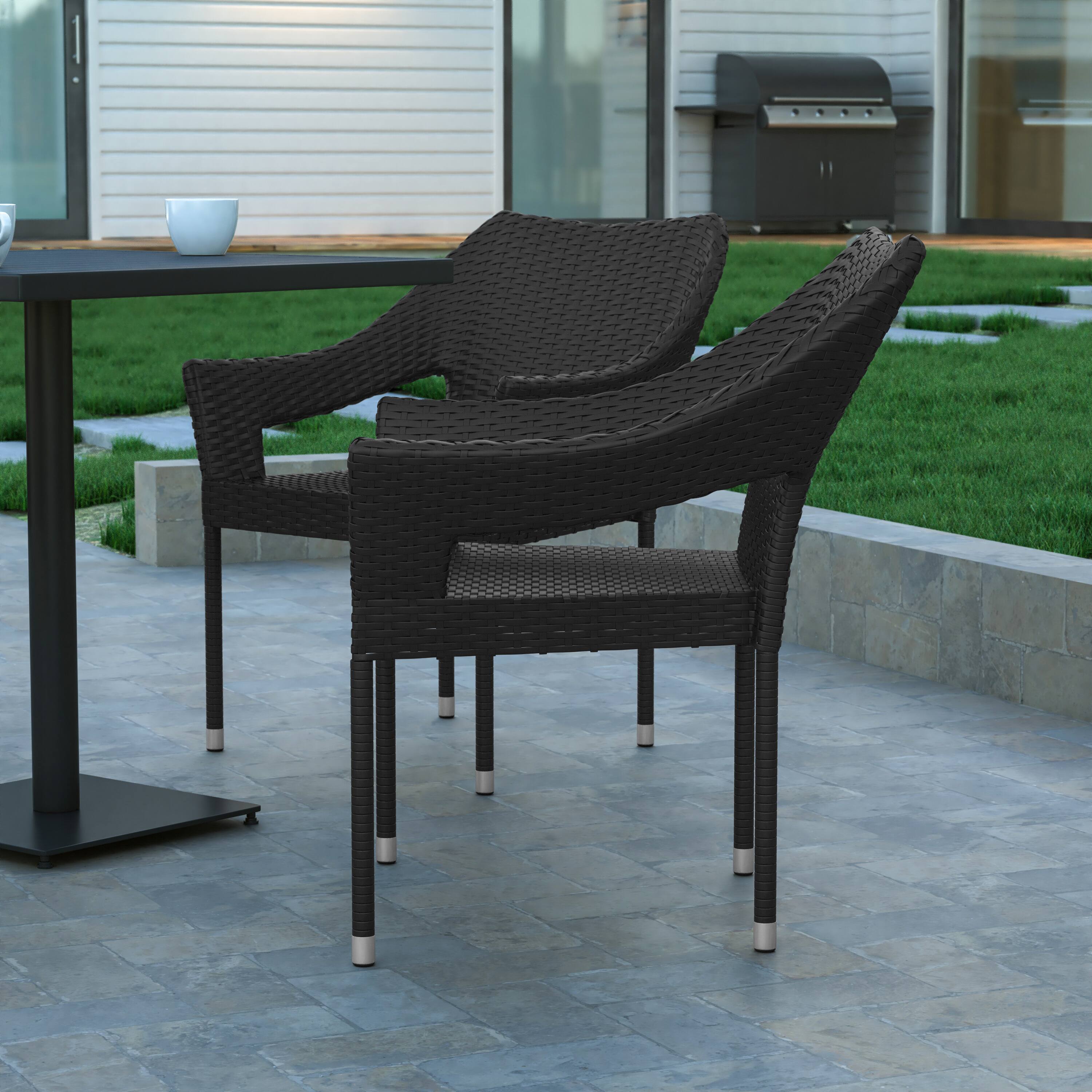Alt View 4. Emma + Oliver - Embry All-Weather Indoor/Outdoor Stacking Patio Dining Chair with Steel Frame and Weather Resistant PE Rattan - Black.
