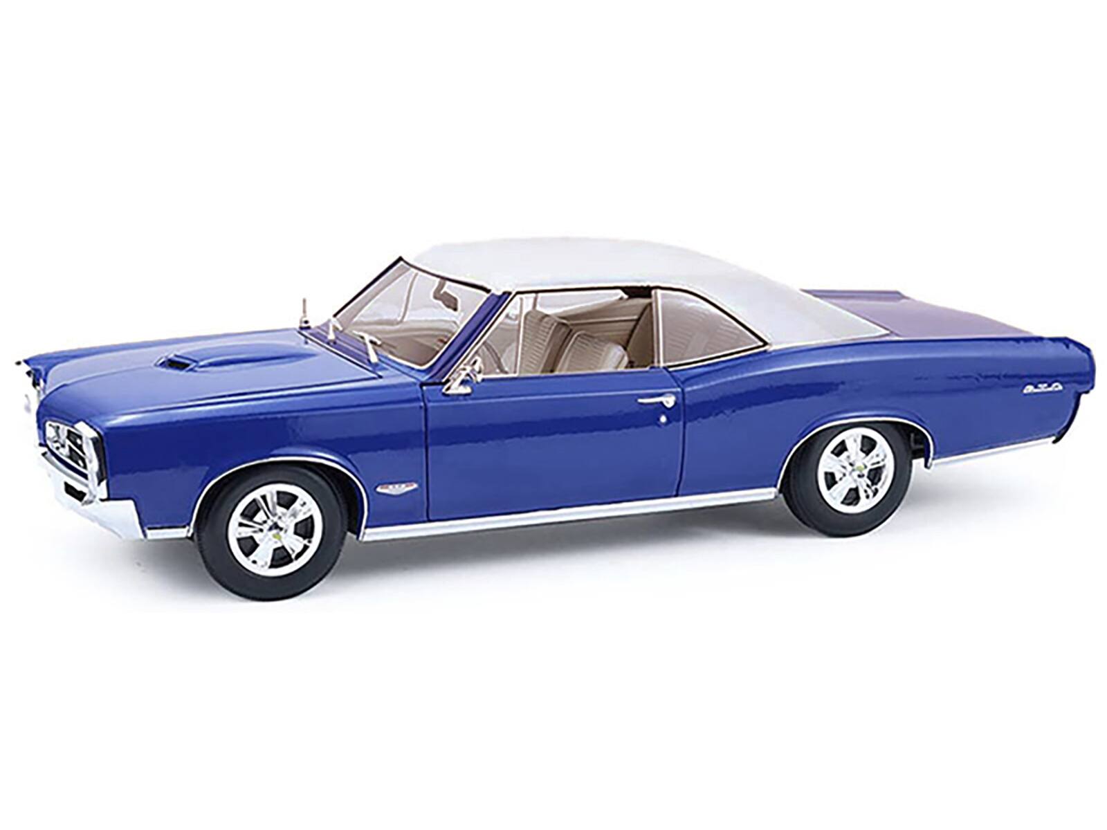 Angle. Highway 61 - 1966 Pontiac GTO Barrier Blue with White Top and Interior 1/18 Diecast Model Car by Highway 61 - Blue with White.