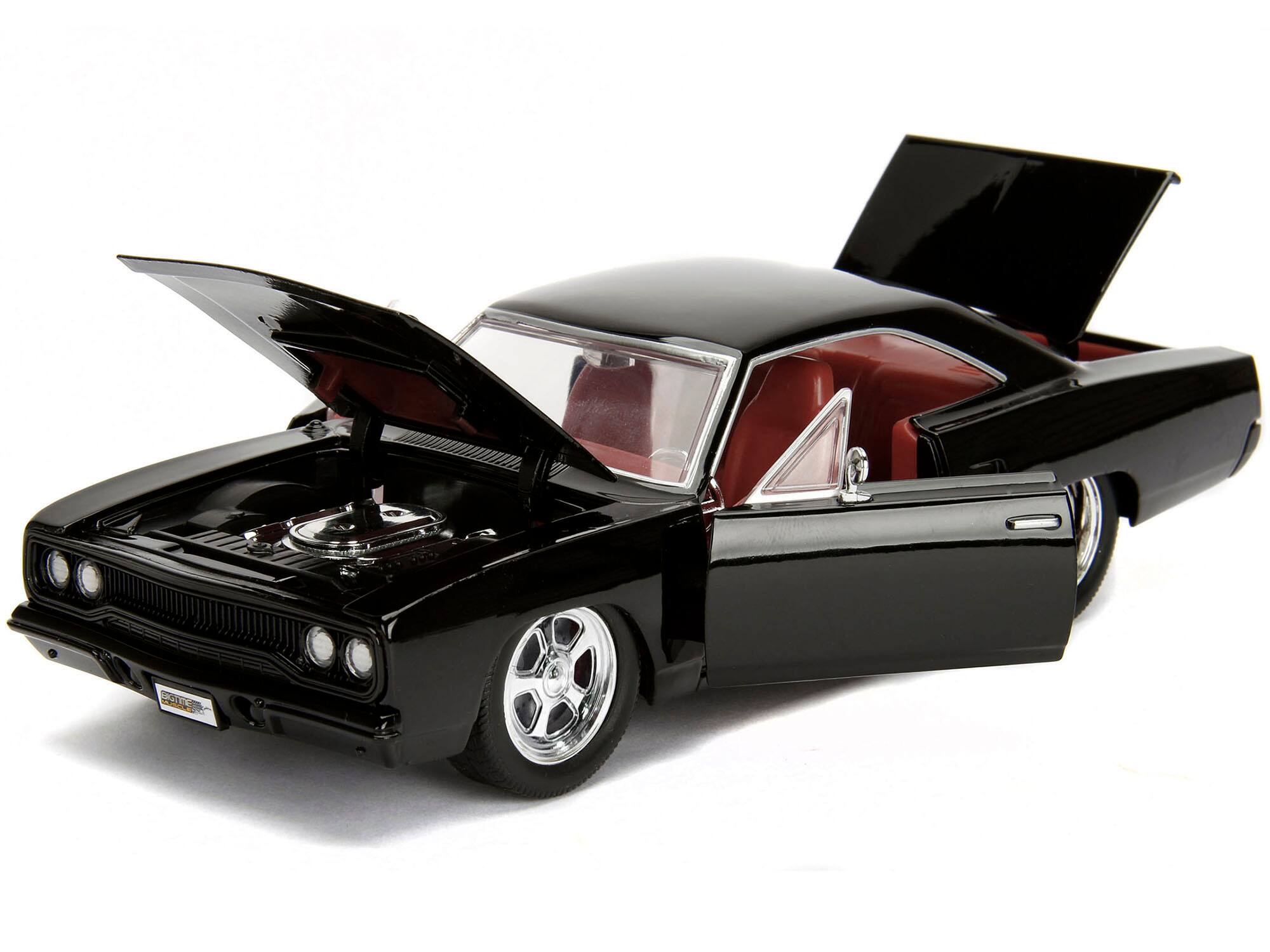 Angle. Jada - 1970 Plymouth Road Runner 440 Black with Red Interior "Bigtime Muscle" Series 1/24 Diecast Model Car by Jada - Black And Red.
