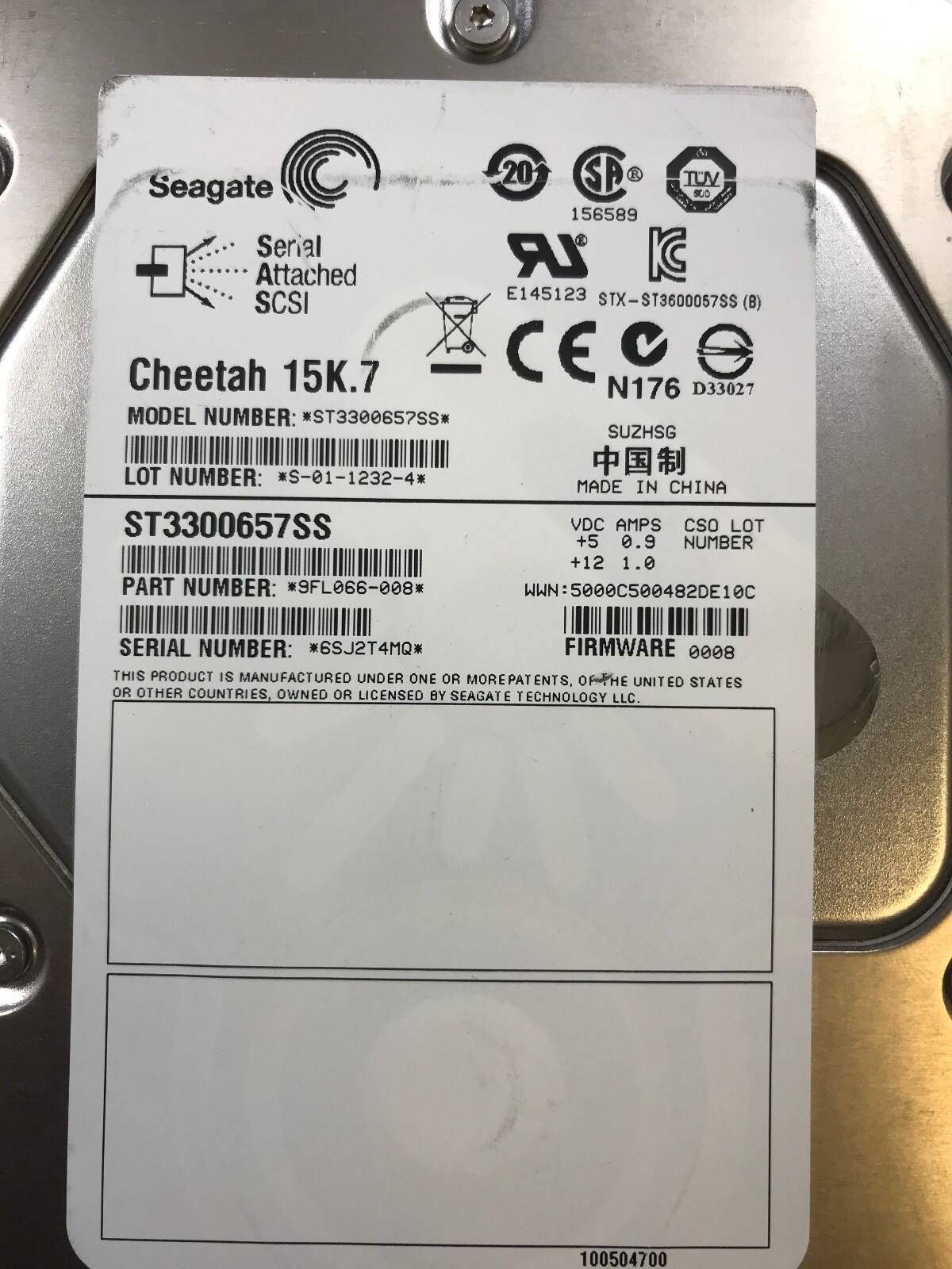 Seagate  
Cheetah 15K.7  

MODEL NUMBER: *ST3300657SS*  
LOT NUMBER: *S-01-1232-4*  
ST3300657SS  
PART NUMBER: *9FL066-008*  
MADE IN CHINA  

Serial Attached SCSI (B)  

SERIAL NUMBER: *6SJ2T4MQ*  
FIRMWARE: 0008  

THIS PRODUCT IS MANUFACTURED UNDER ONE OR MORE PATENTS OF THE UNITED STATES OR OTHER COUNTRIES, OWNED OR LICENSED BY SEAGATE TECHNOLOGY LLC.  

20 SP TUV 156589  
E145123 STX-ST3600057SS (B)  
CEC N176 D33027  
SUZHSG  
中国制  

VDC AMPS  
+5 0.9  
+12 1.0  

CSO LOT NUMBER  

WWN: 5000C500482DE10C  

100504700