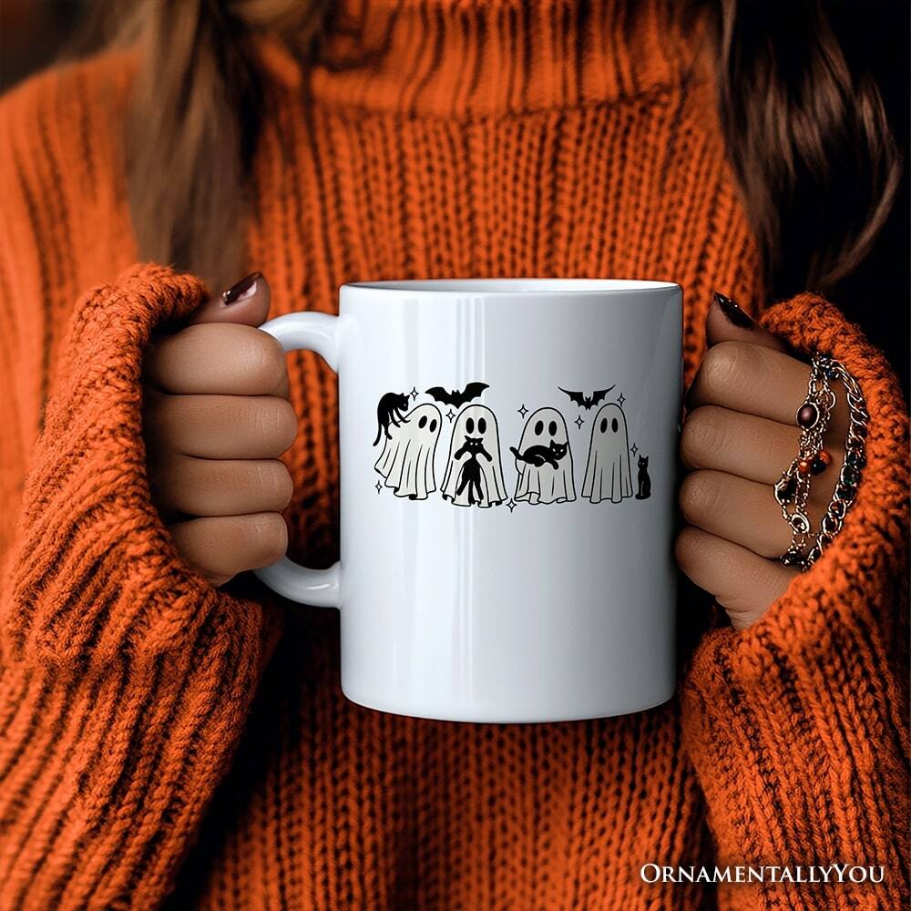 Left. OrnamentallyYou - Ghosts and Cats Spooky Mug, Whimsical Halloween Gift - White.