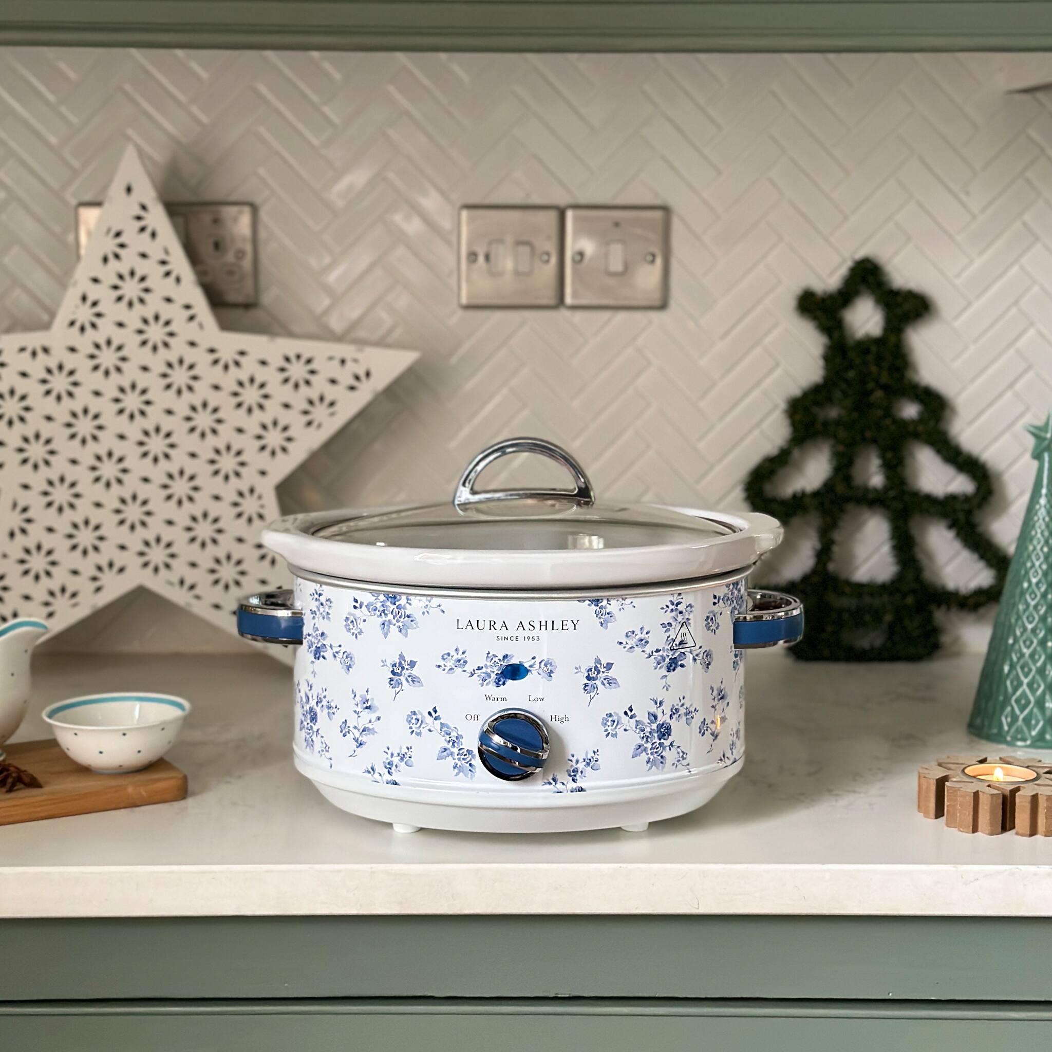 LAURA ASHLEY

Low  |  High  
Warm  |  Off