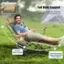 Full Body Support: The image features a man sitting in a chair with a full body support, which provides comfort and relaxation. The chair has a soft padded headrest and footrest, designed to help release foot fatigue. The man appears to be enjoying his time in the chair, which is a great way to unwind and relax.