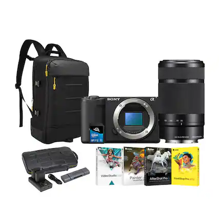 The image features a Sony camera and lens, along with a backpack, a memory card, and a book. The camera and lens are placed next to the backpack, while the memory card and book are positioned nearby. The backpack appears to be a Sony backpack, and the book is likely related to photography or camera use. The combination of these items suggests that the owner of the camera and lens is a photographer or someone who enjoys taking pictures and possibly traveling with their equipment.